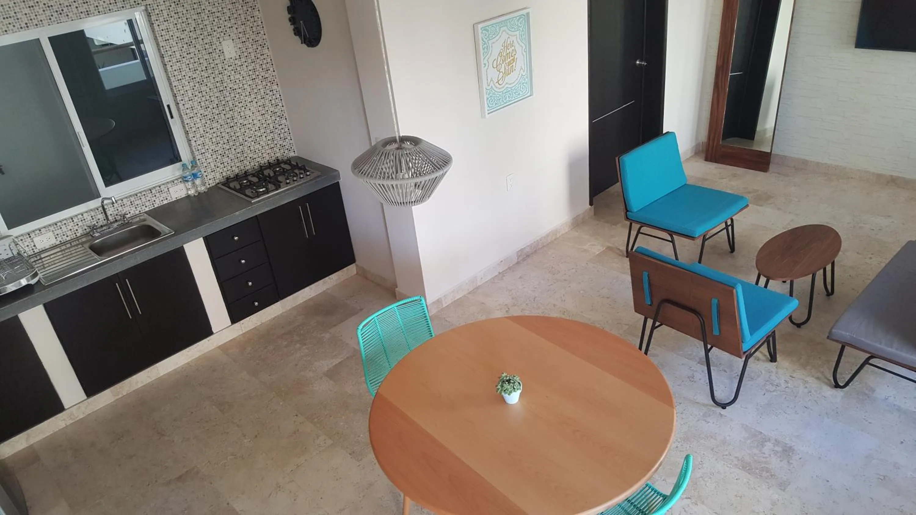 Kitchen or kitchenette in Shavanna Hotel Boutique