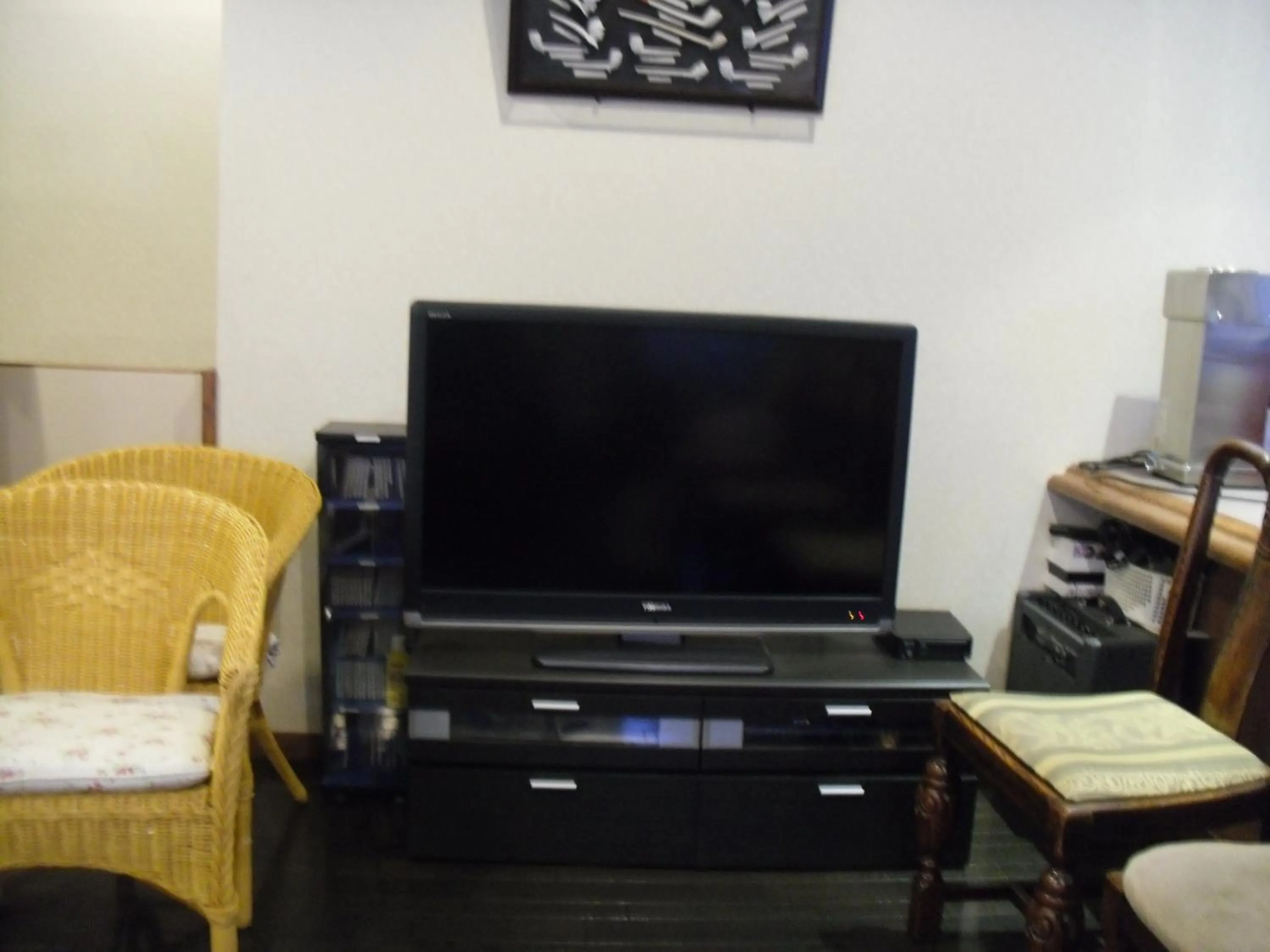 Communal lounge/ TV room in Gasthof Ascot