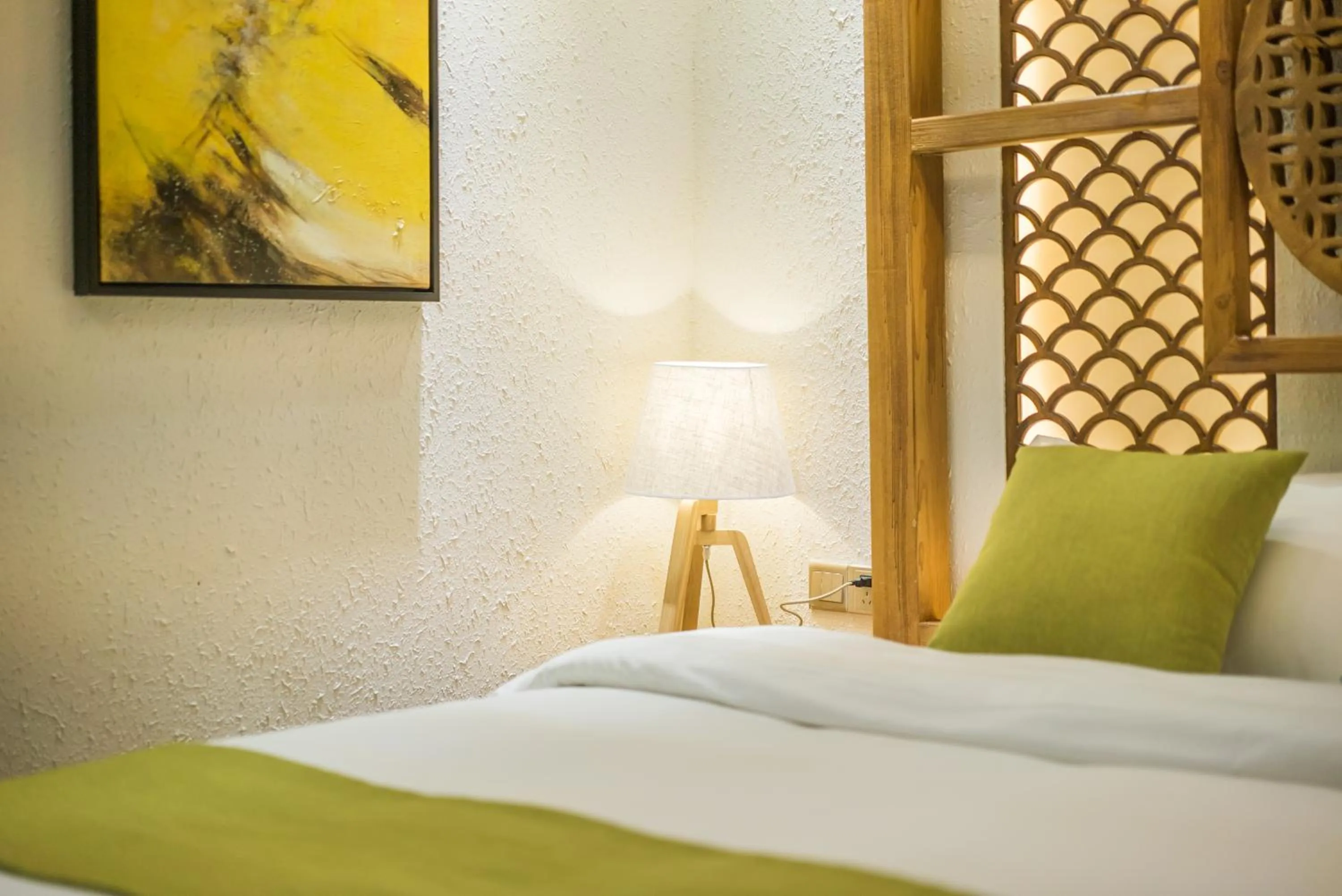 Decorative detail, Bed in Lijiang Yue Tu Inn