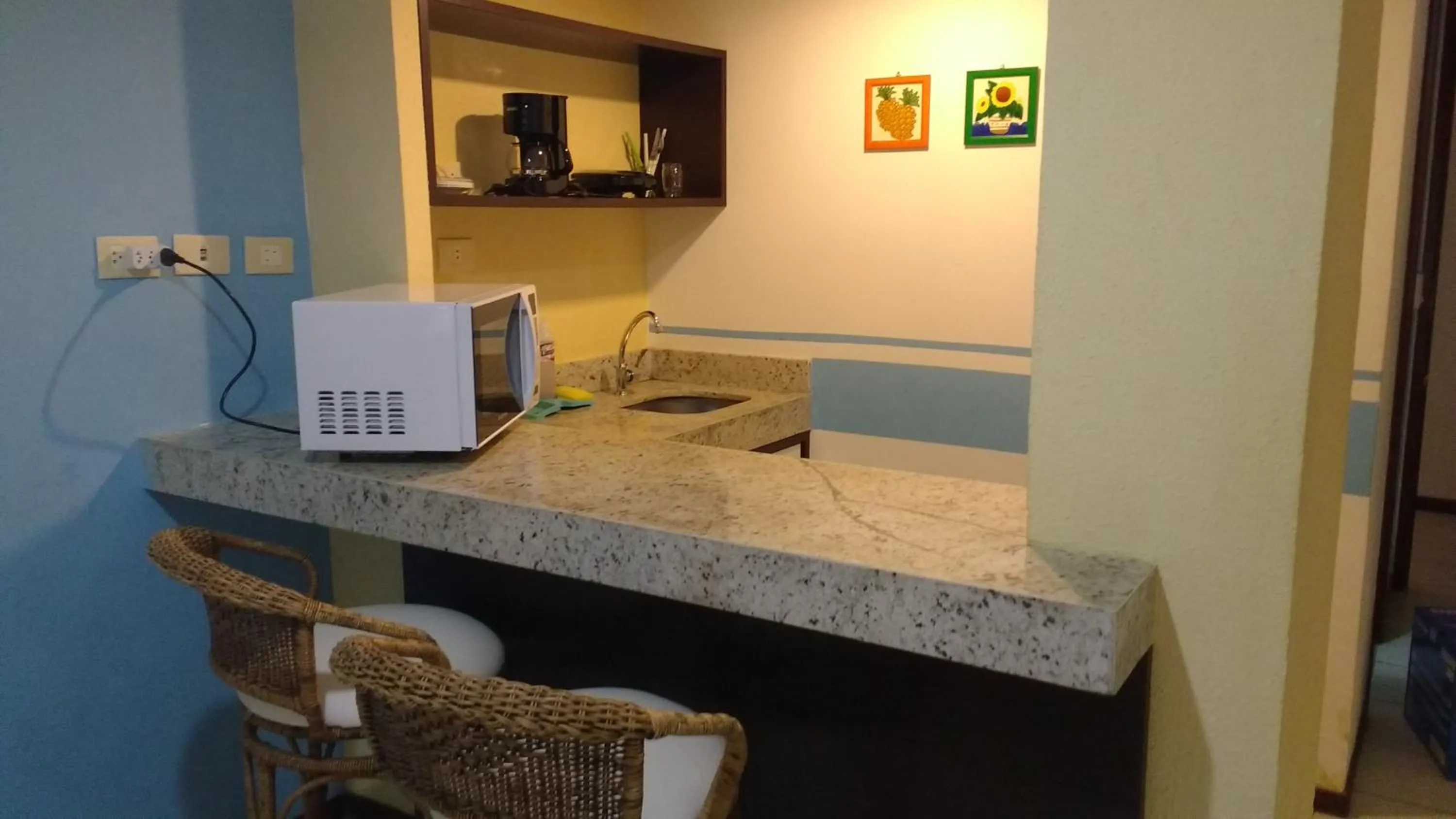 Kitchen or kitchenette in Pipa's Bay Apartamentos