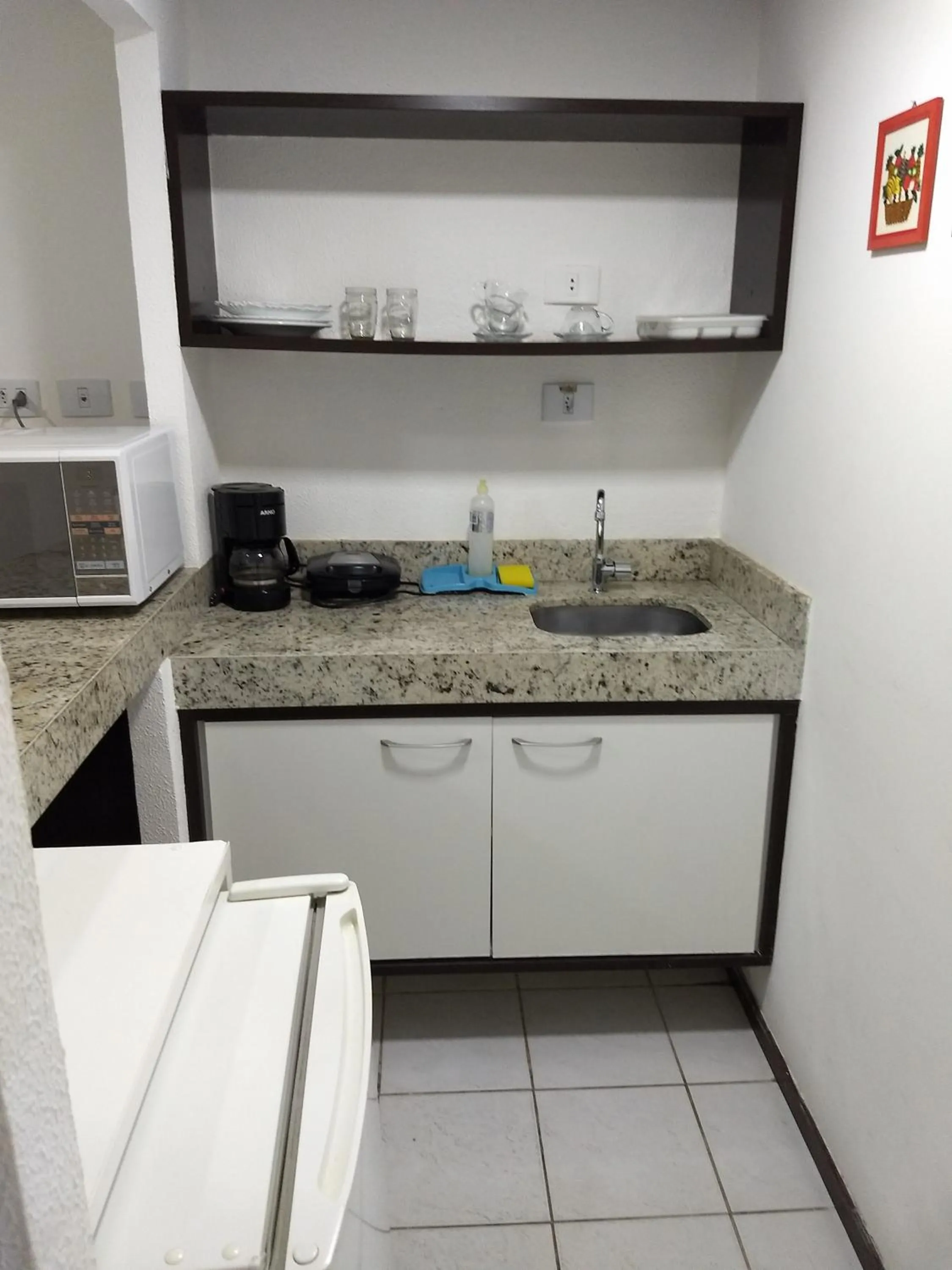 Kitchen or kitchenette in Pipa's Bay Apartamentos