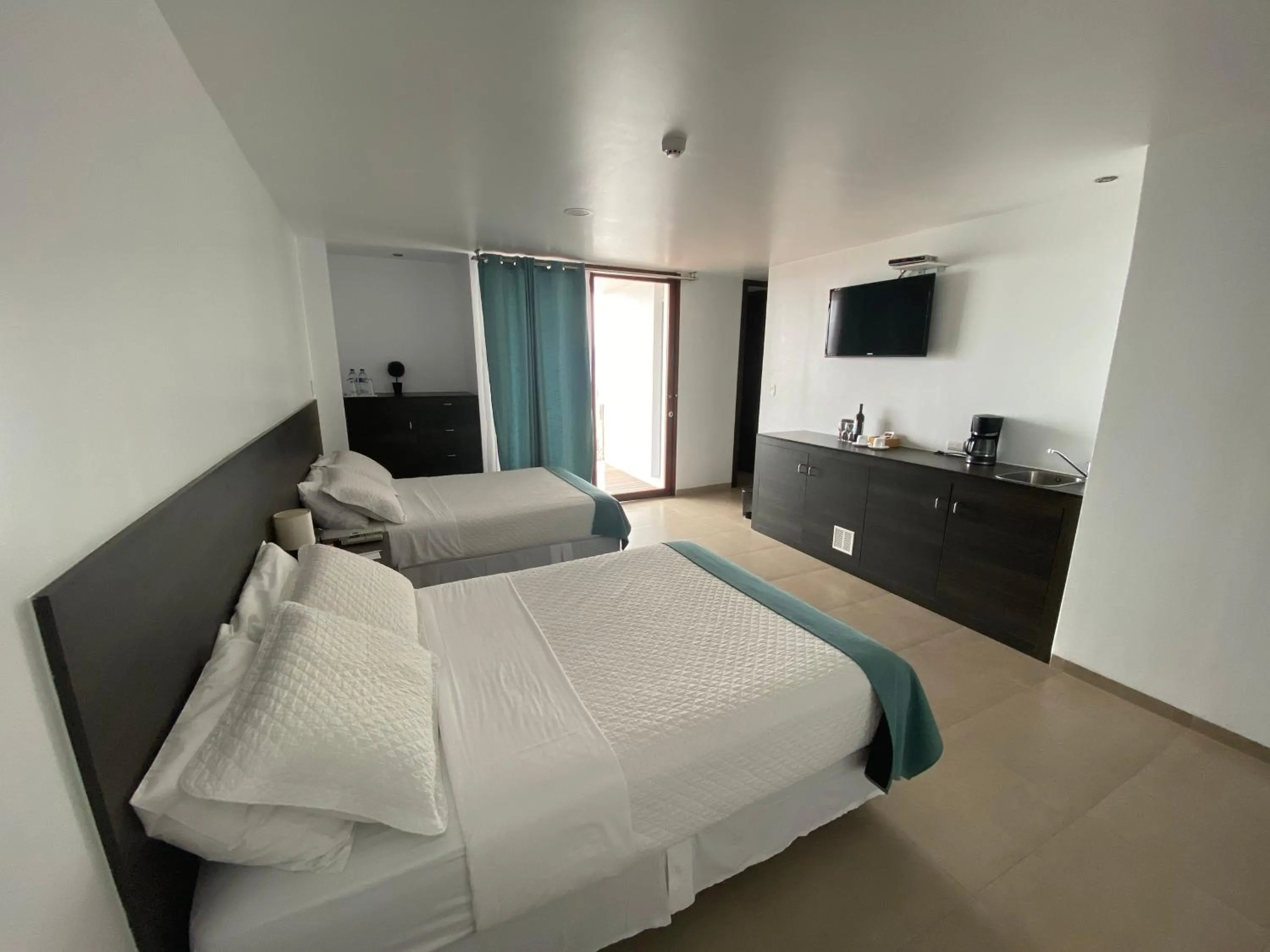 Bed in Galapagos Sunset Hotel