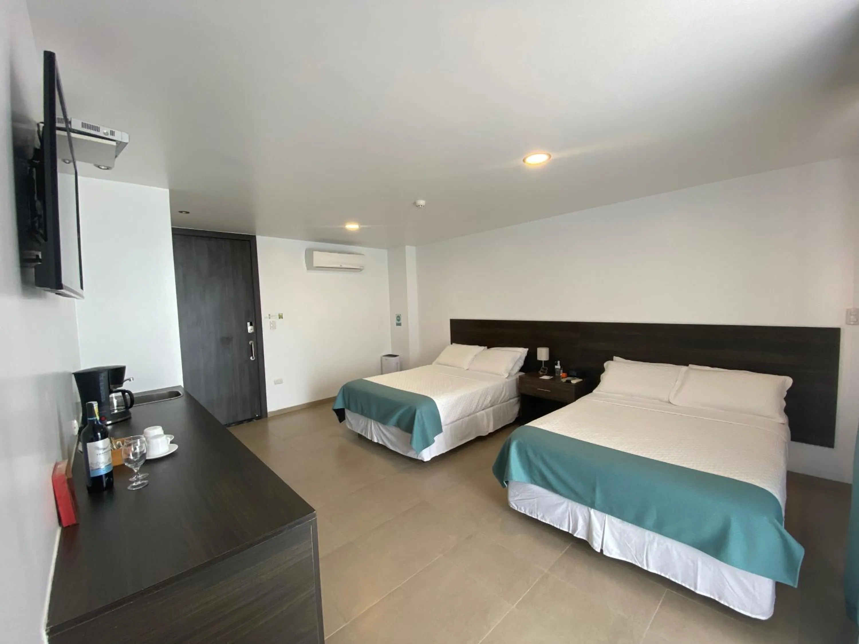 Bed in Galapagos Sunset Hotel