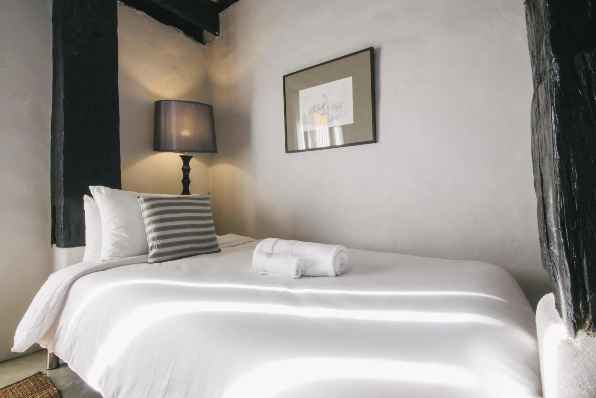 Bed in Chotana Villa Hotel Chiang Mai