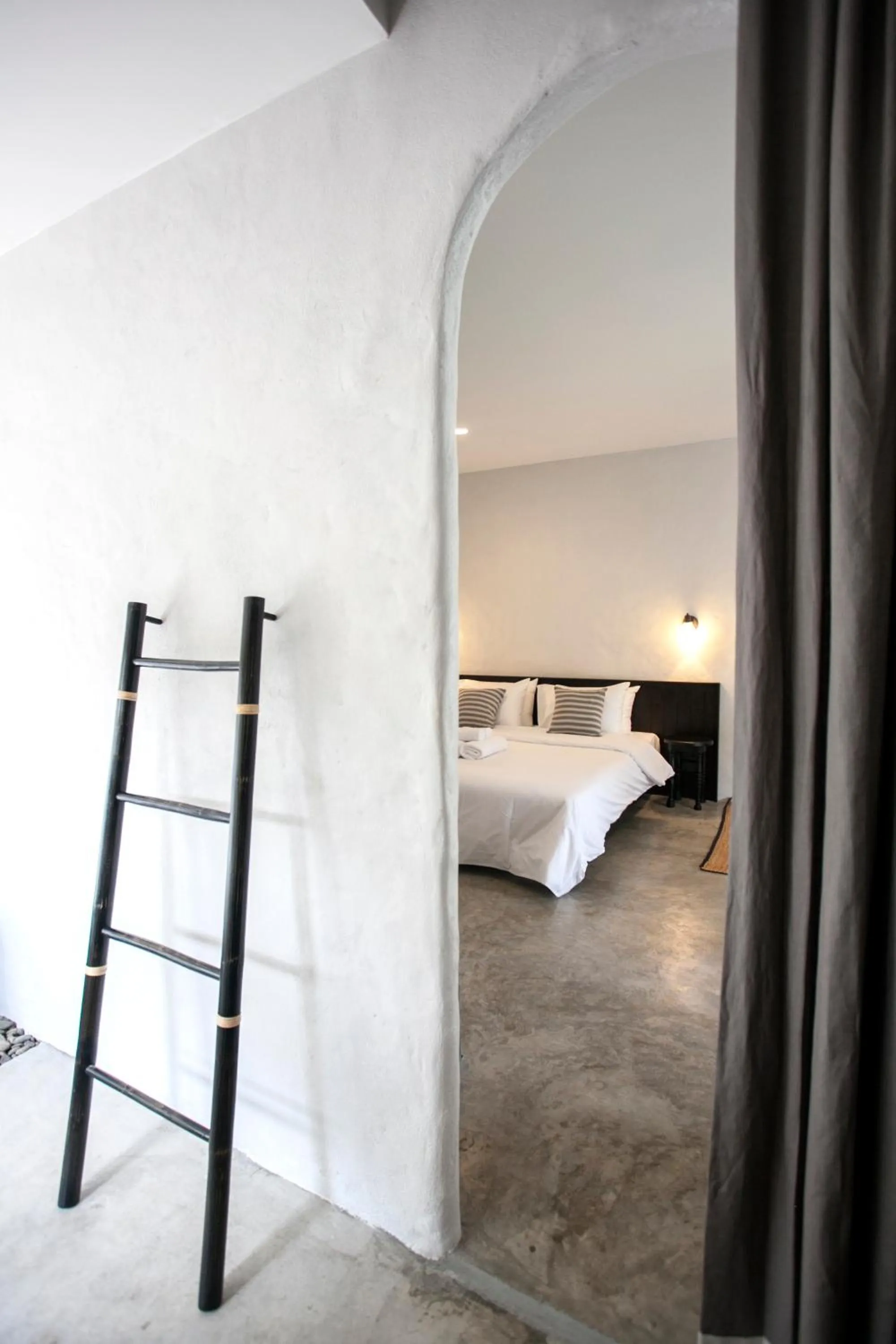 Bed in Chotana Villa Hotel Chiang Mai