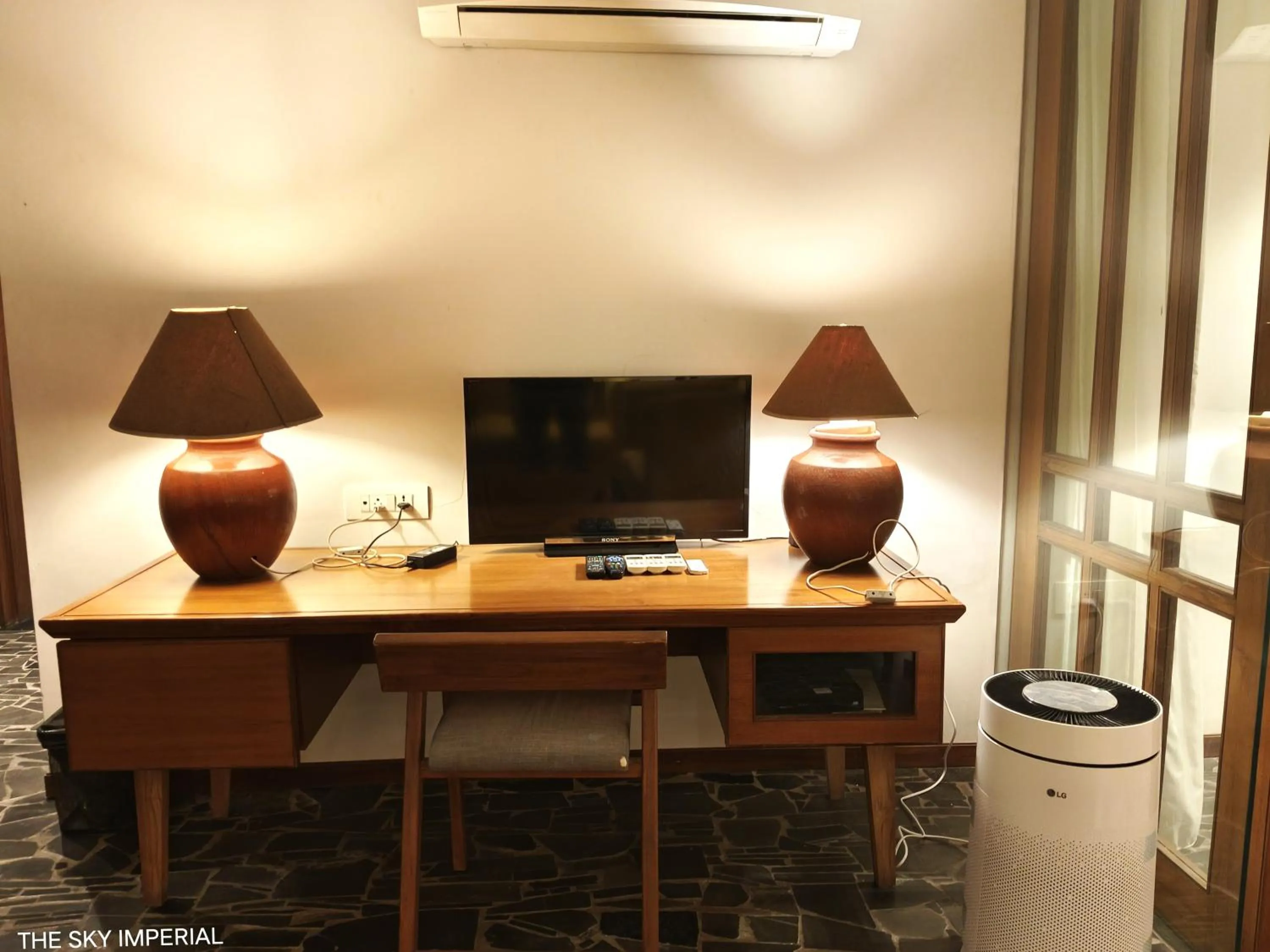 TV and multimedia in The Sky Imperial Aarivaa Luxury Stays