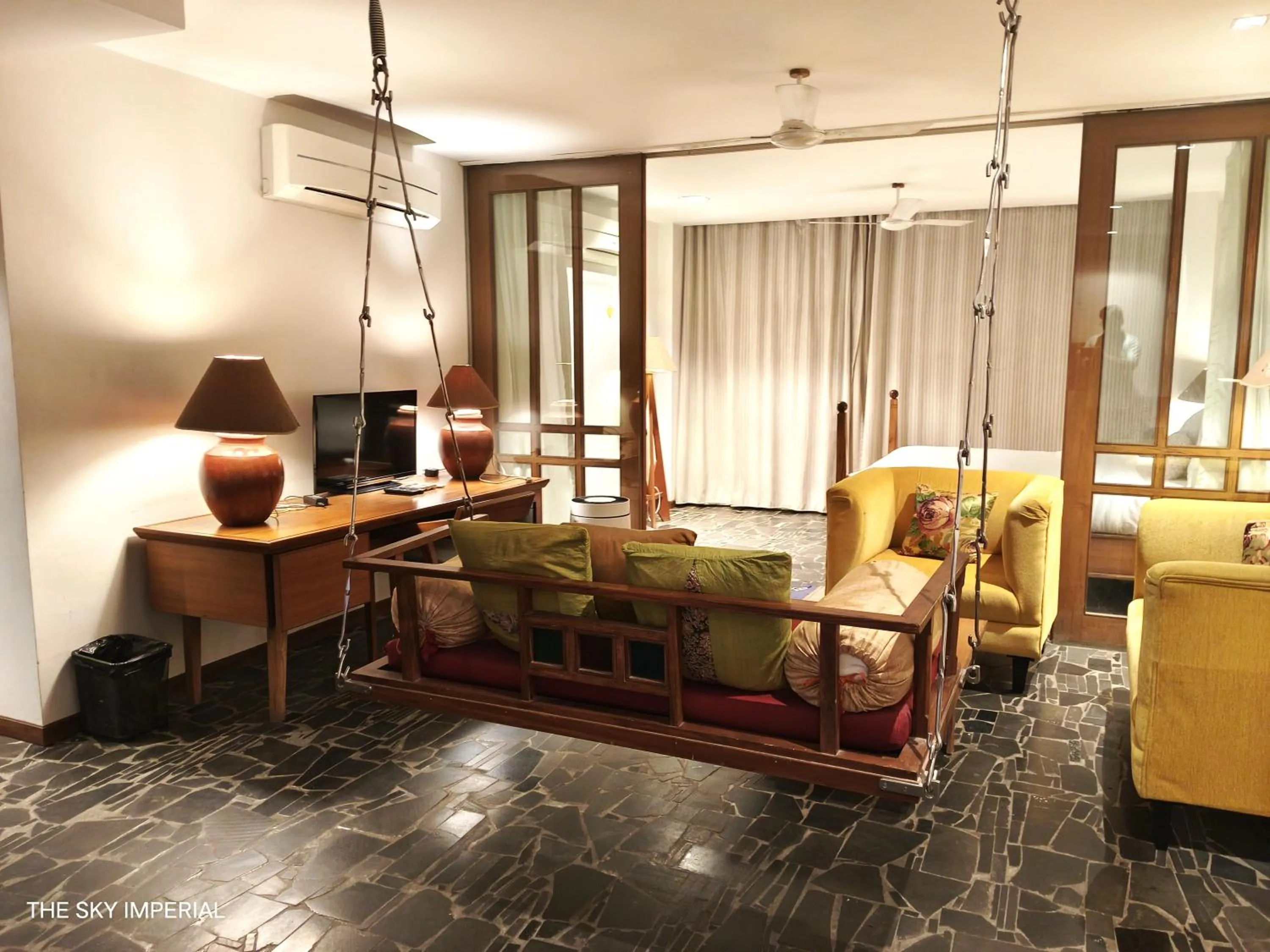 Seating area in The Sky Imperial Aarivaa Luxury Stays