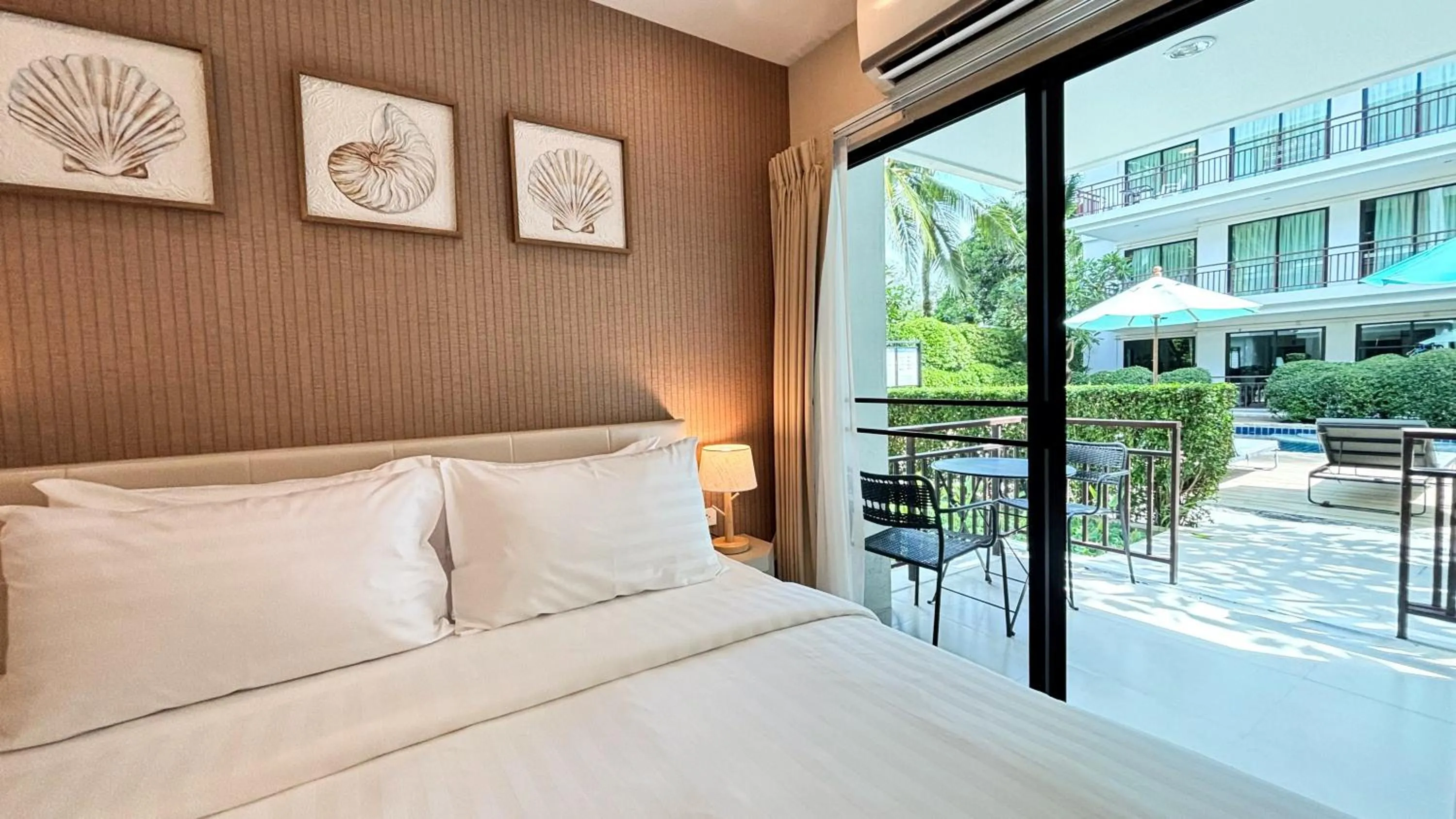 Bed in The Title KR Beach Condotel Rawai Beach