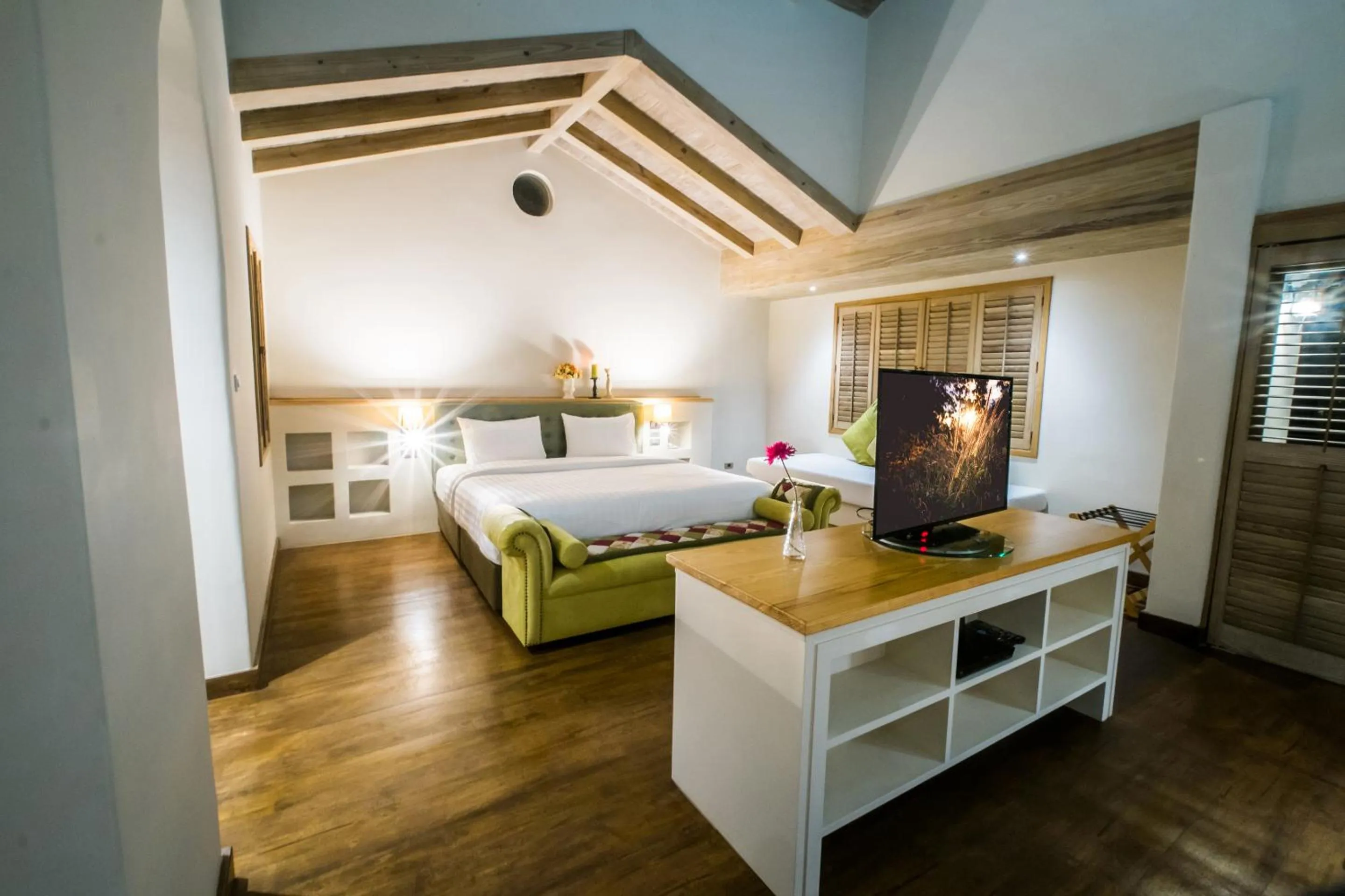 Bed in Mela Garden Retreat Cottage