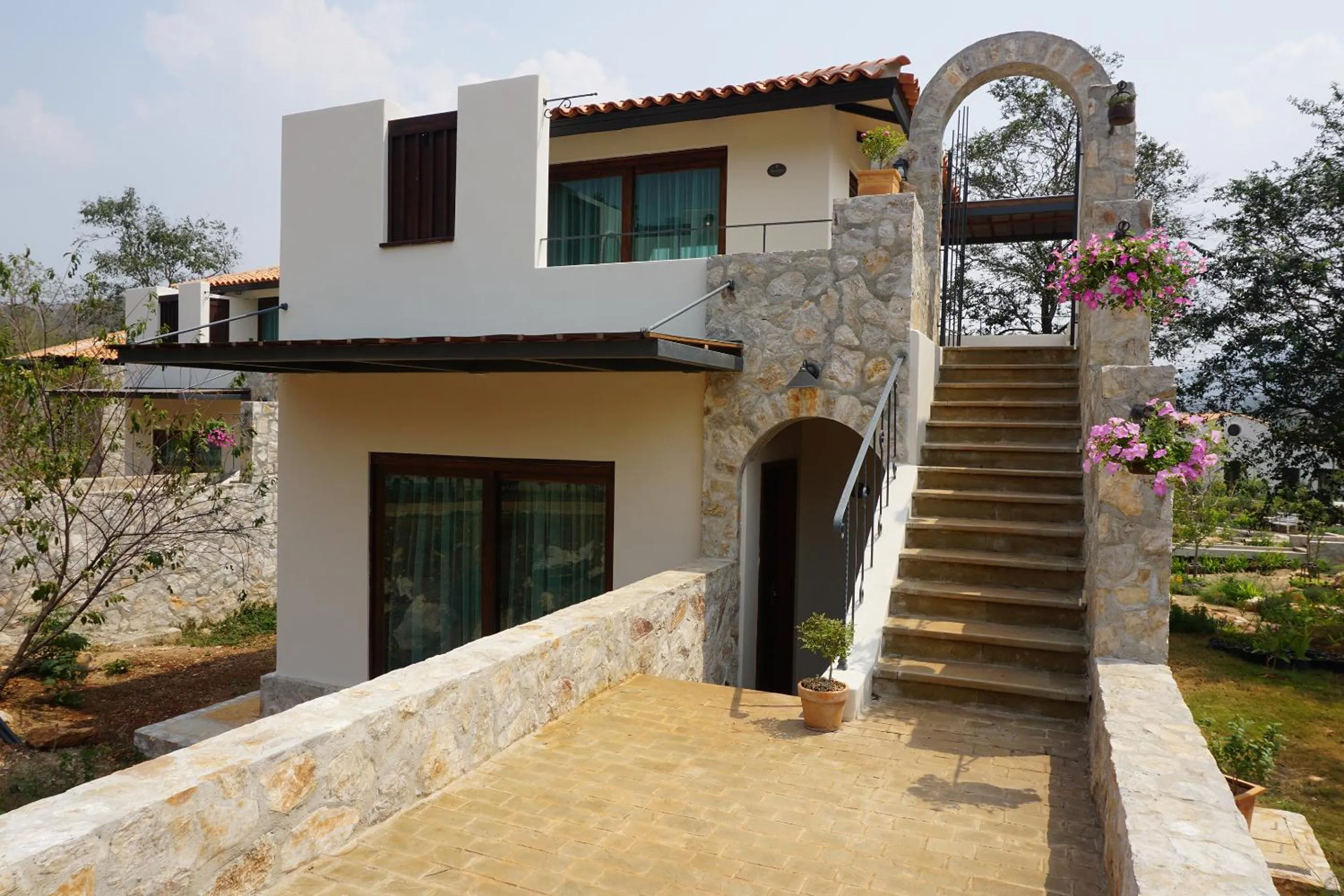 Bed in Mela Garden Retreat Cottage