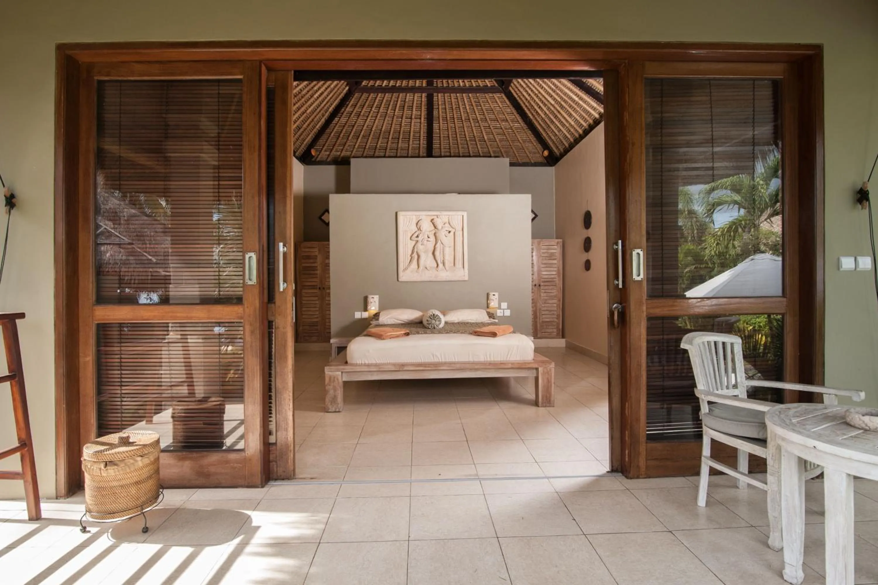 Seating area, Bed in Relax Bali Dive & SPA ocean front resort