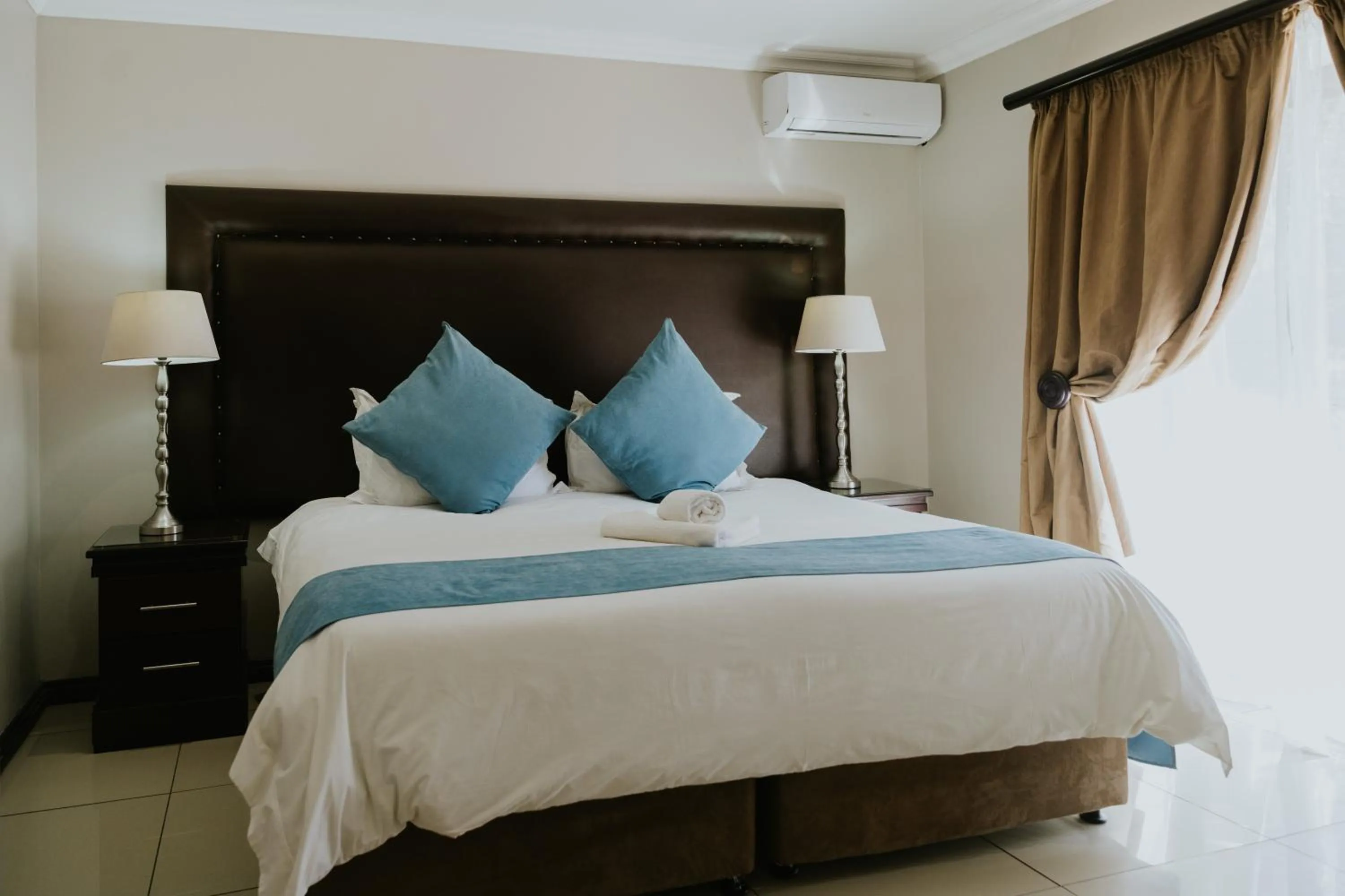 Bed in Le Grand Chateau Hotel