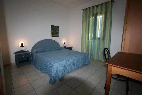 Photo of the whole room, Bed in Residence Club Barbara