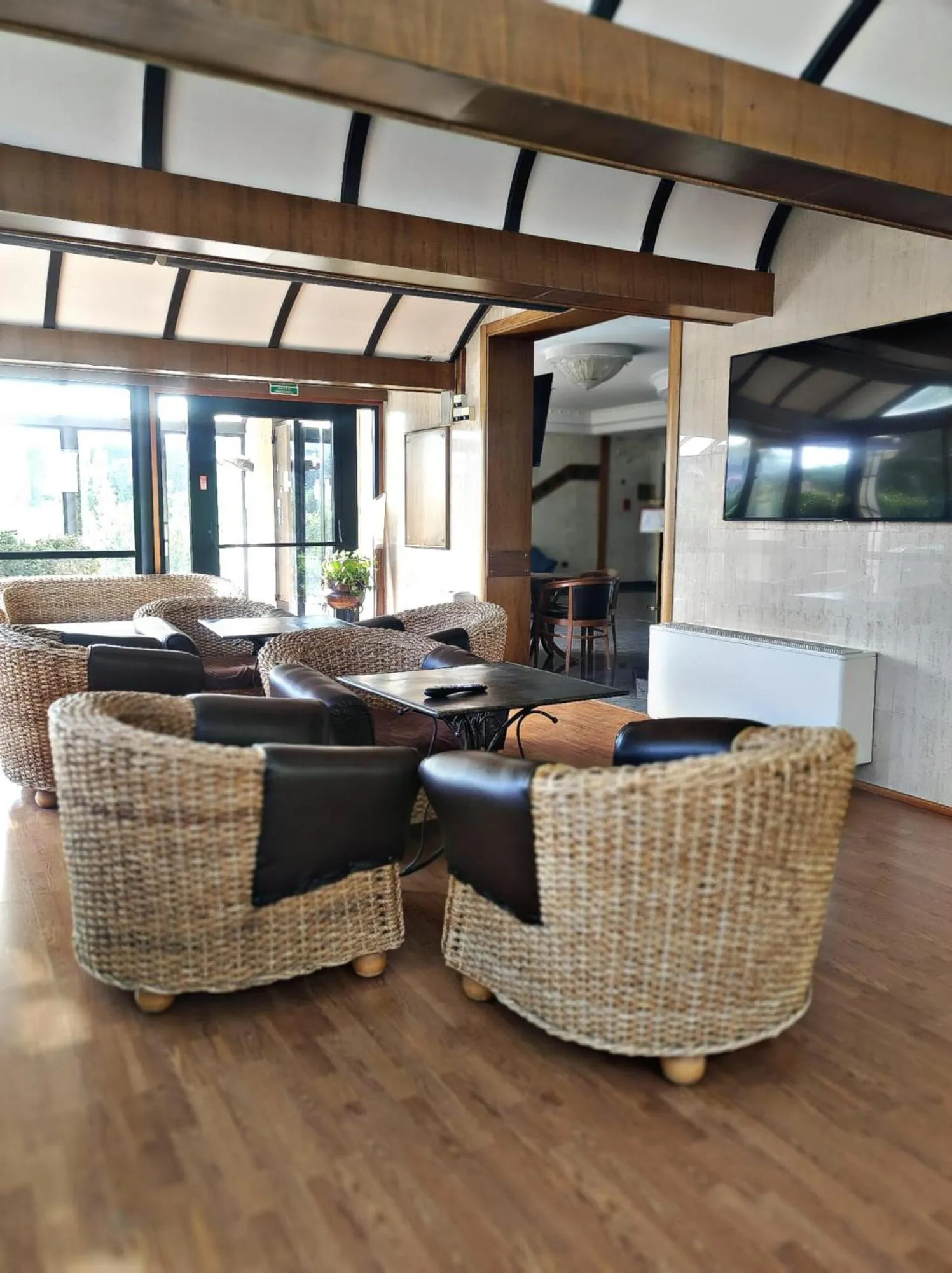 Communal lounge/ TV room in Hotel Holiday