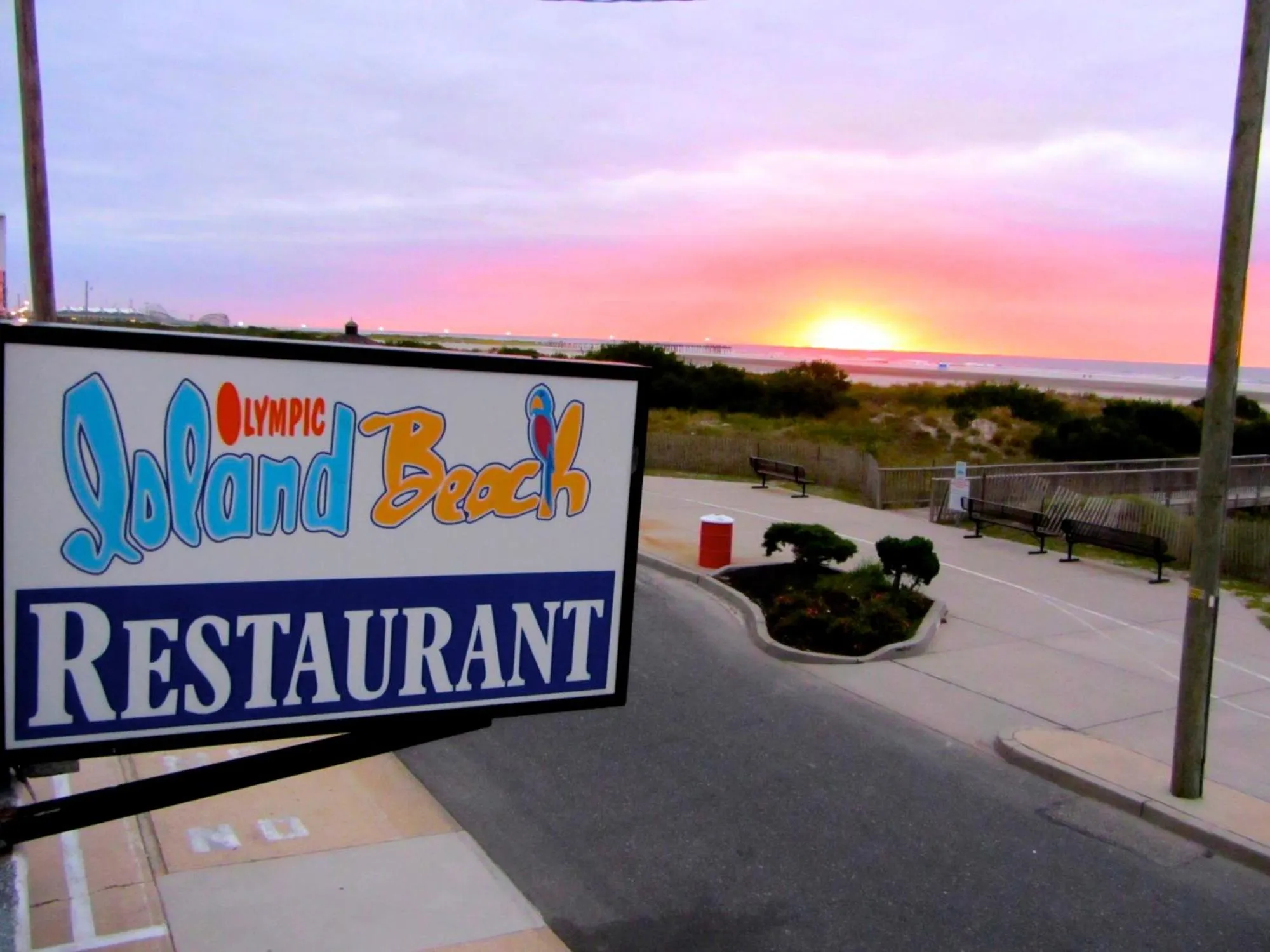 Property logo or sign in Olympic Island Beach Resort