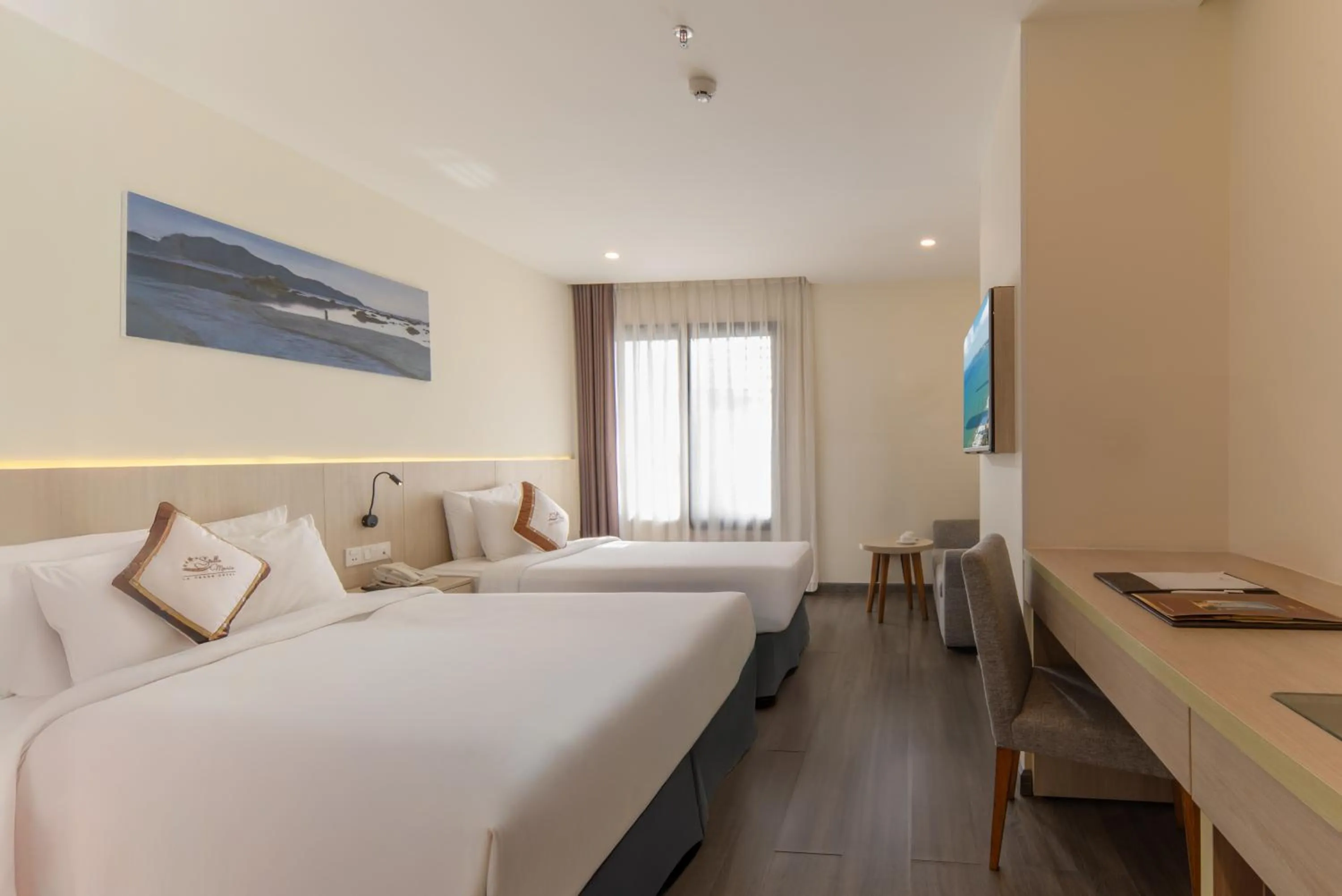 Bed in Stella Maris Nha Trang Hotel