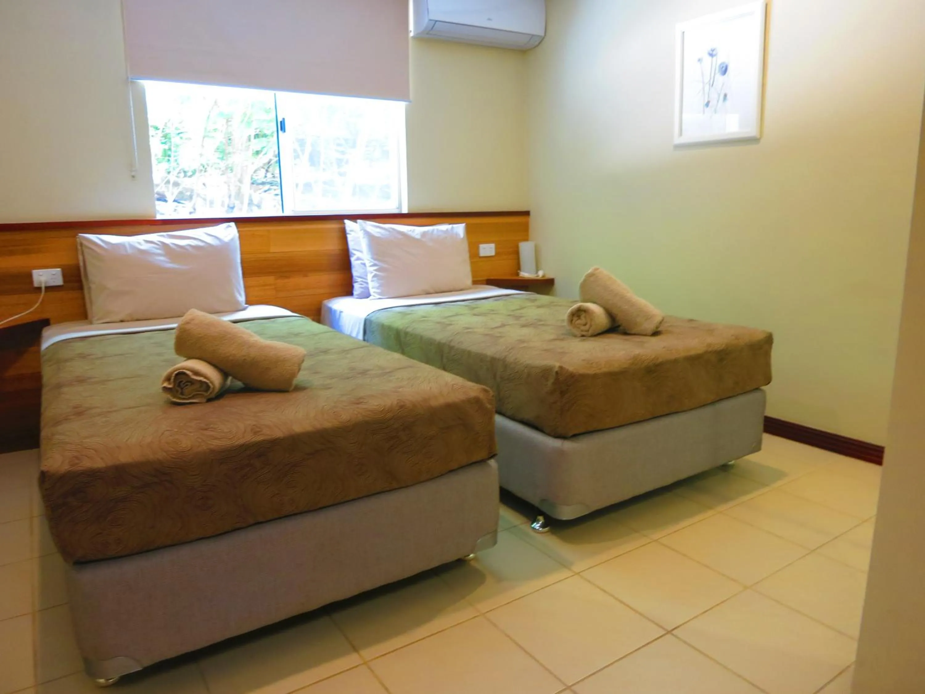 Bed in The Cocos Padang Lodge