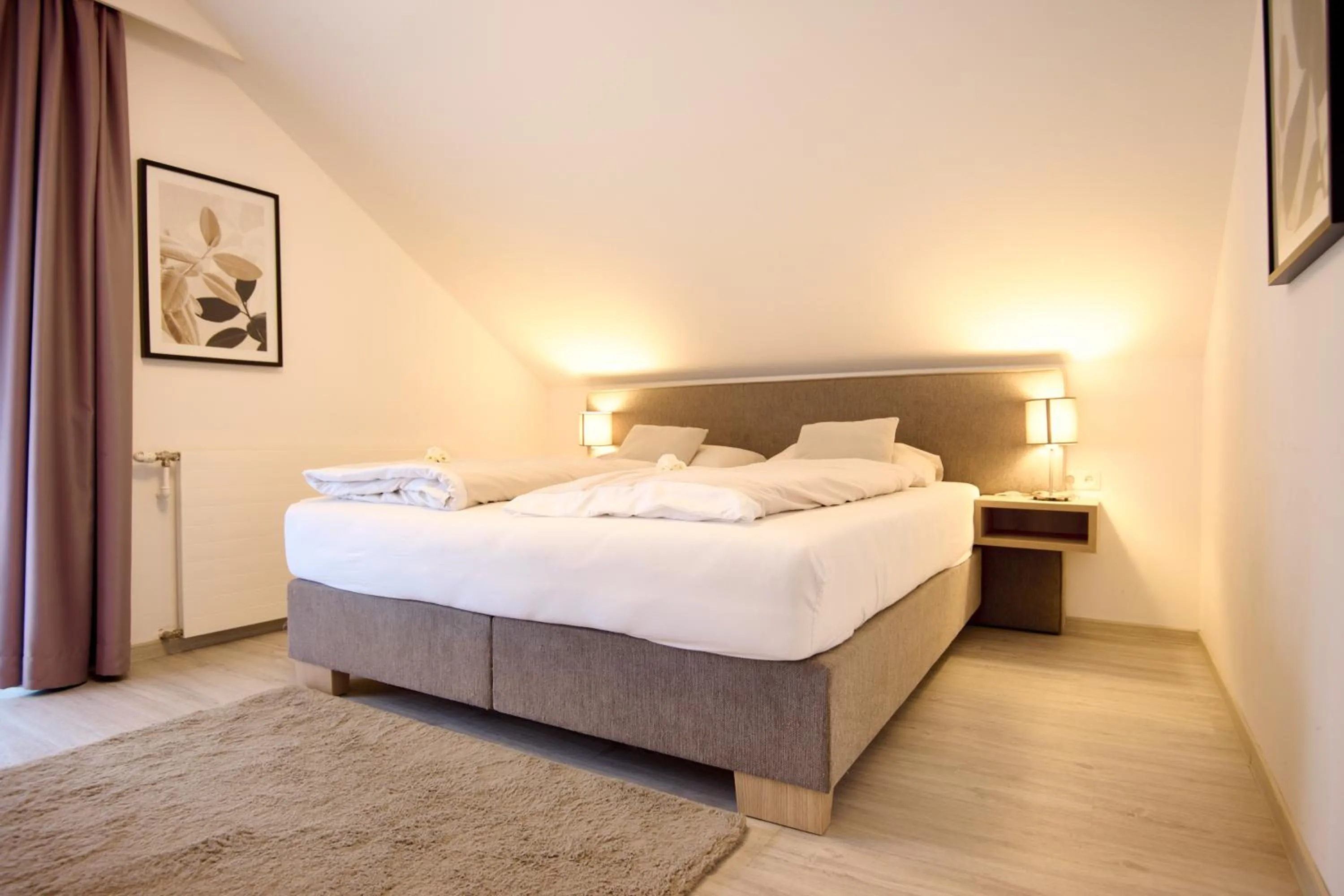 Bed in Pension - Ferienwohnungen Zollner