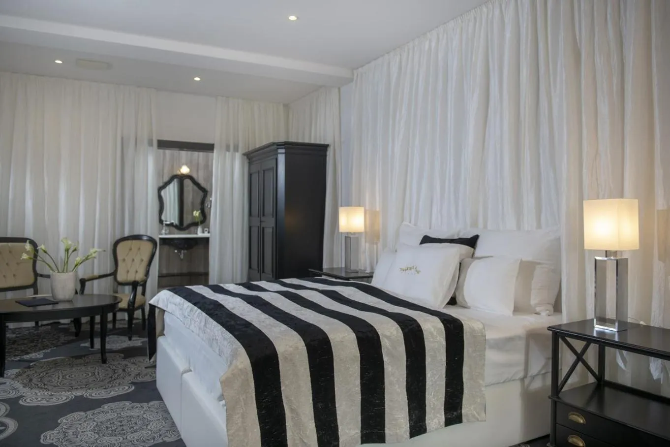 Bed in Erla Villa Boutique Hotel