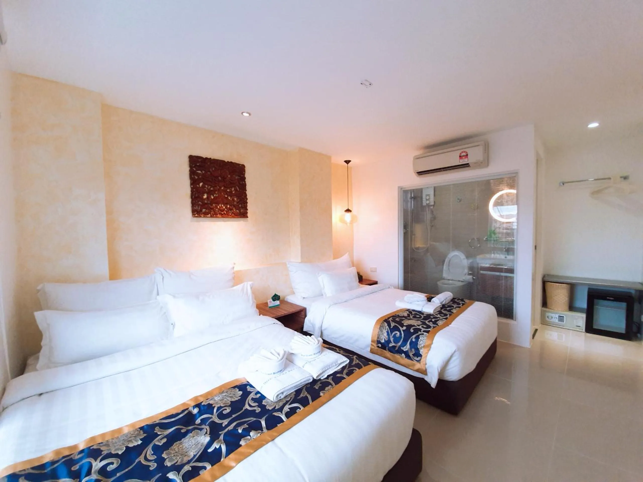 Photo of the whole room, Bed in BLUE OCEAN BOUTIQUE HOTEL - Boracay Island