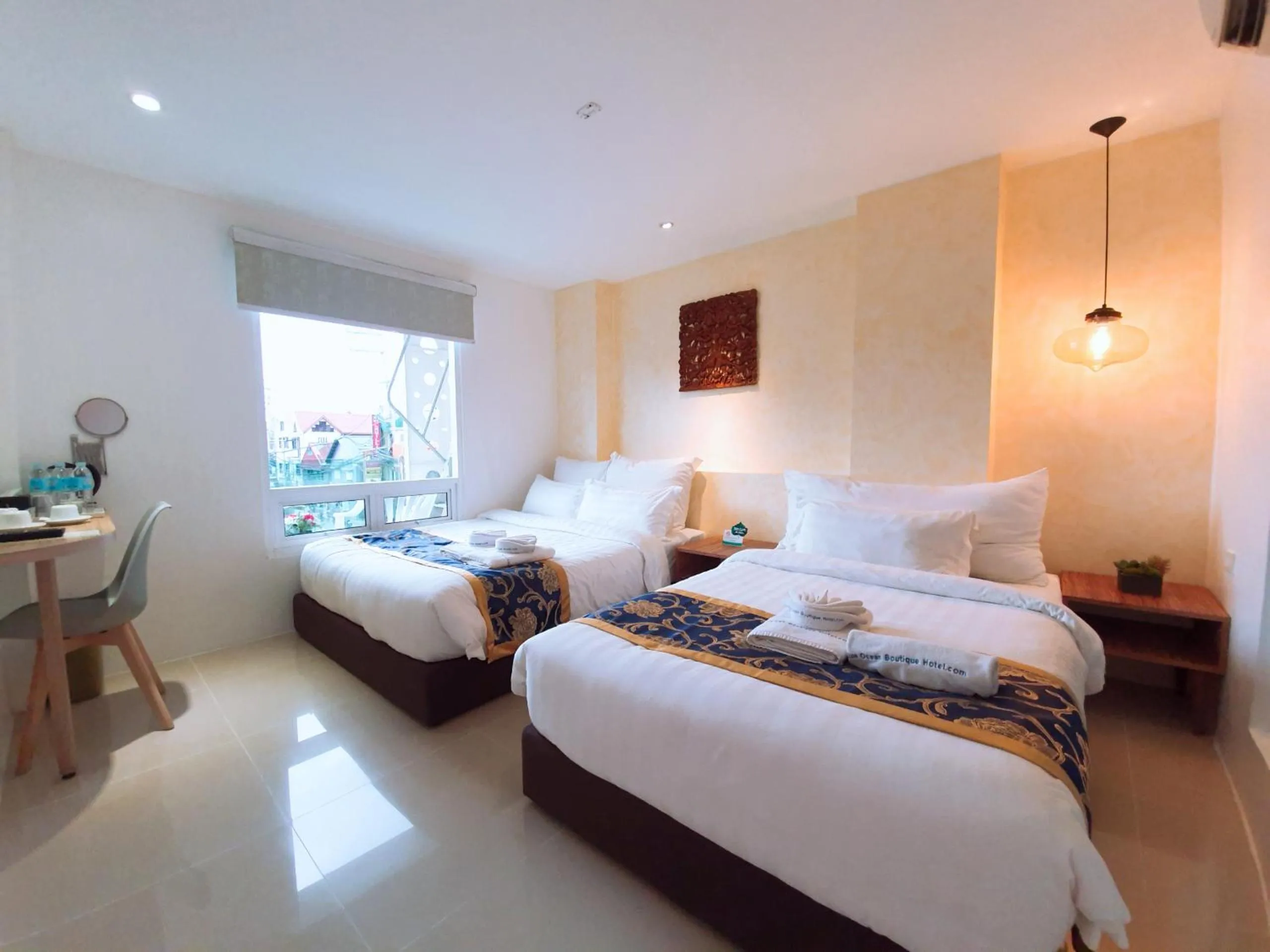 Photo of the whole room, Bed in BLUE OCEAN BOUTIQUE HOTEL - Boracay Island