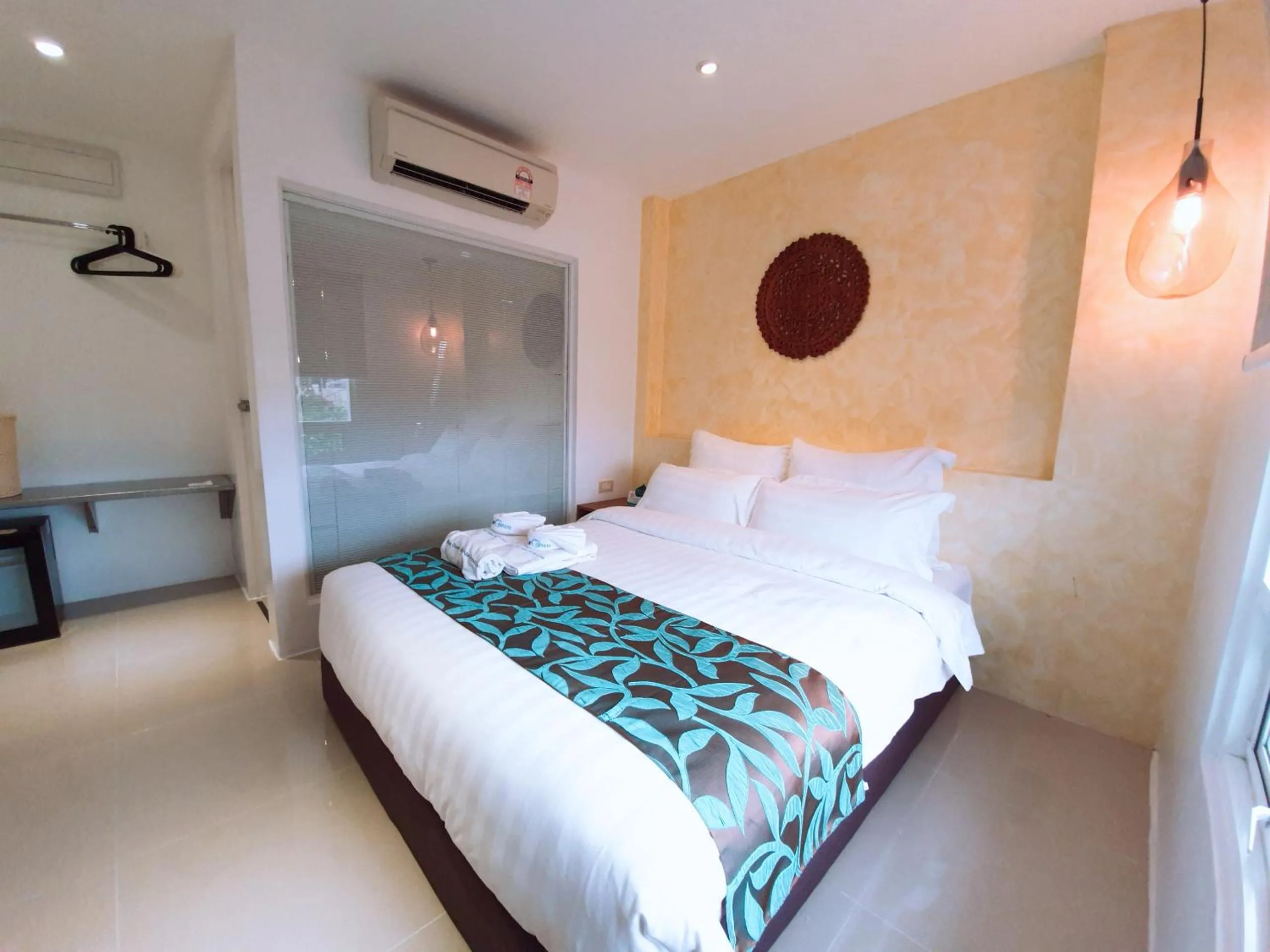 Photo of the whole room, Bed in BLUE OCEAN BOUTIQUE HOTEL - Boracay Island