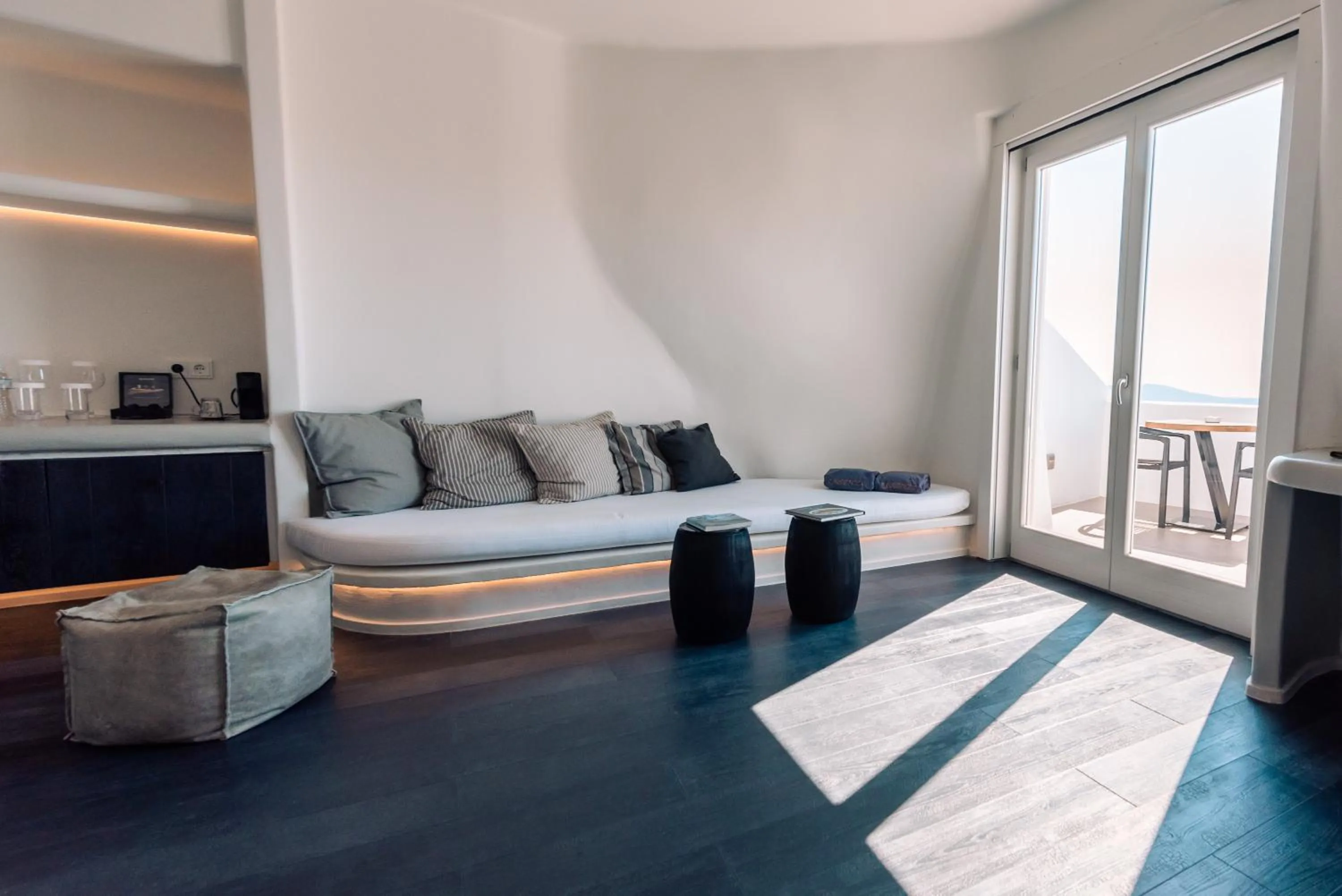 Seating area, Bed in Cavo Tagoo Santorini