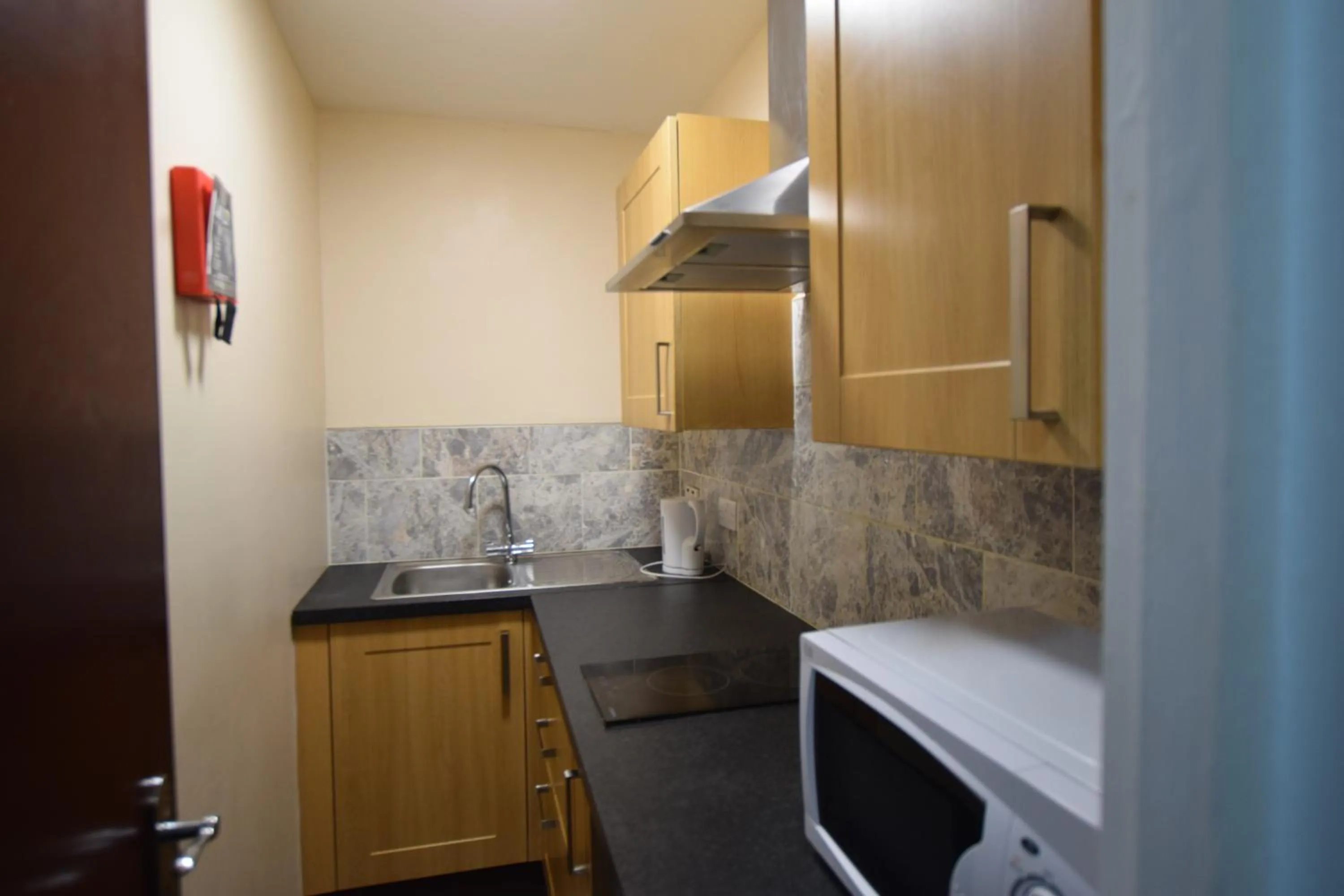 Kitchen or kitchenette in Woodlands Lodge Ilford