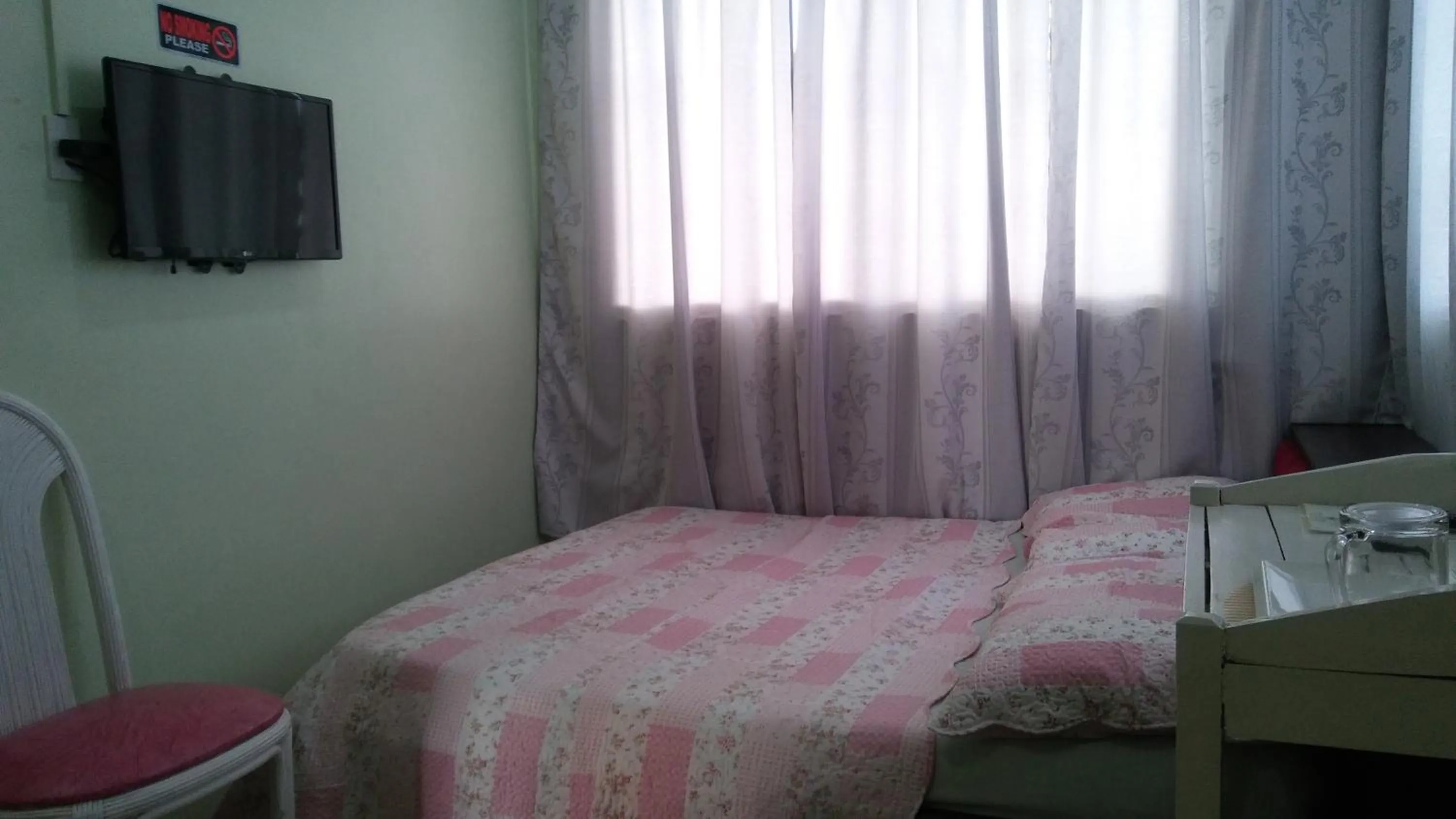 Bed in Dweller's Pensione