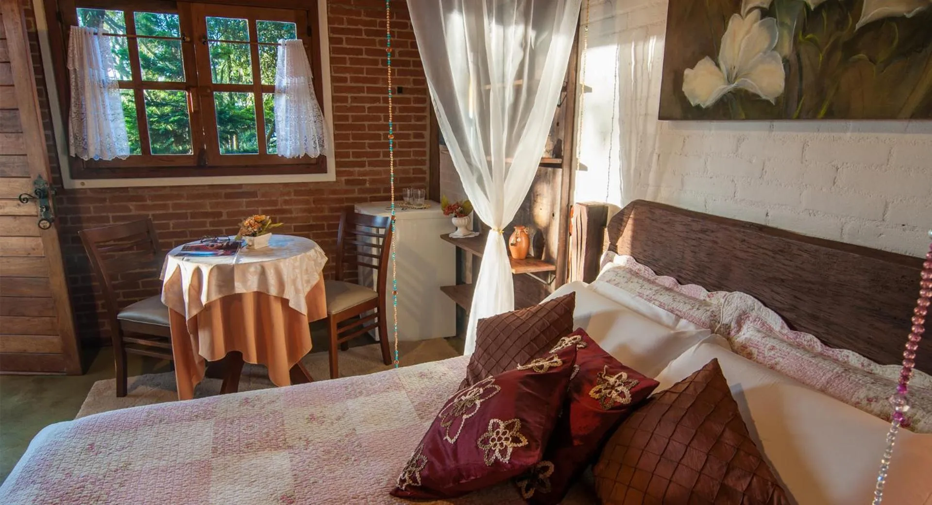 Bed in Pousada Alto da Neblina