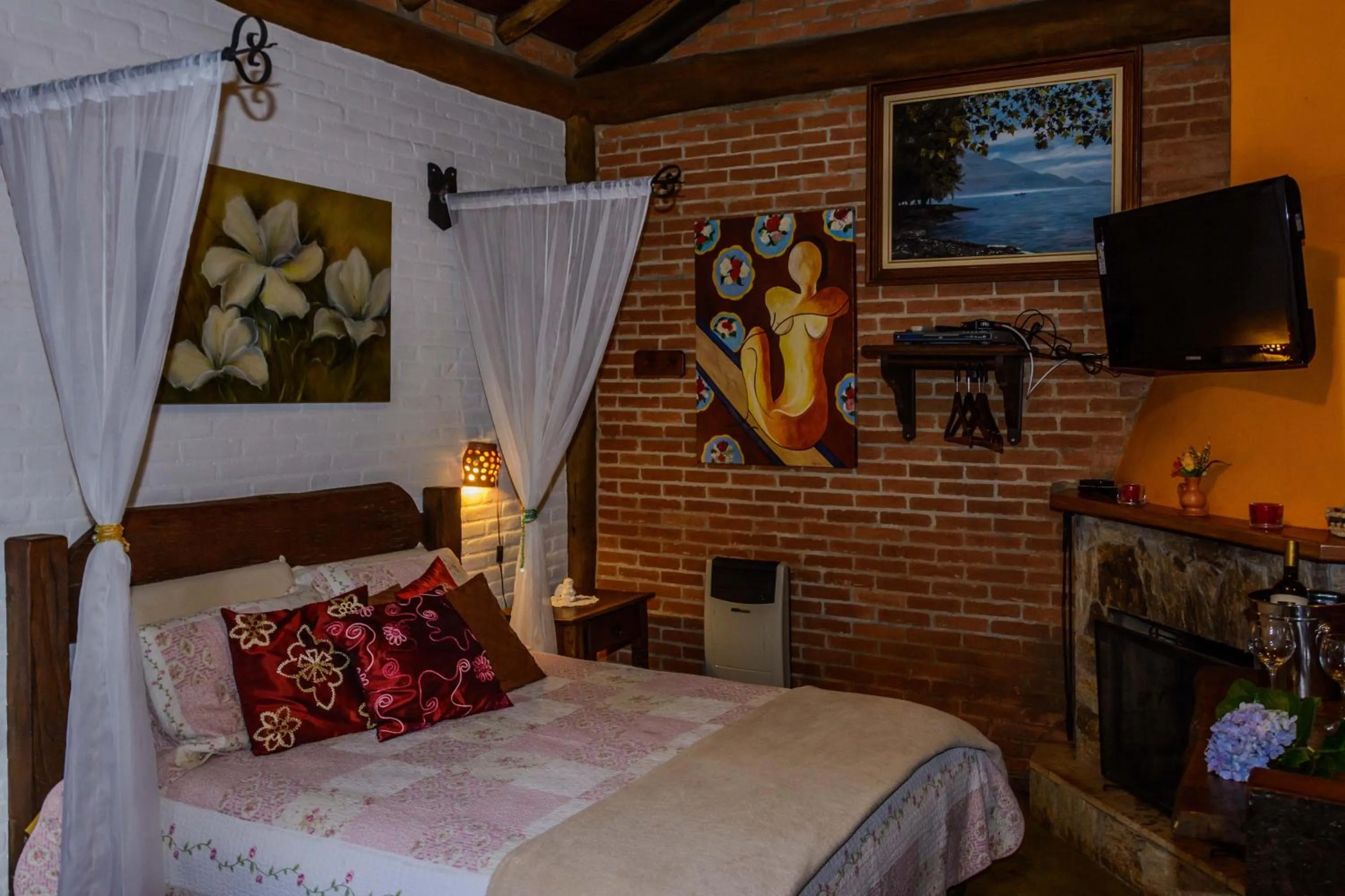 Bed in Pousada Alto da Neblina