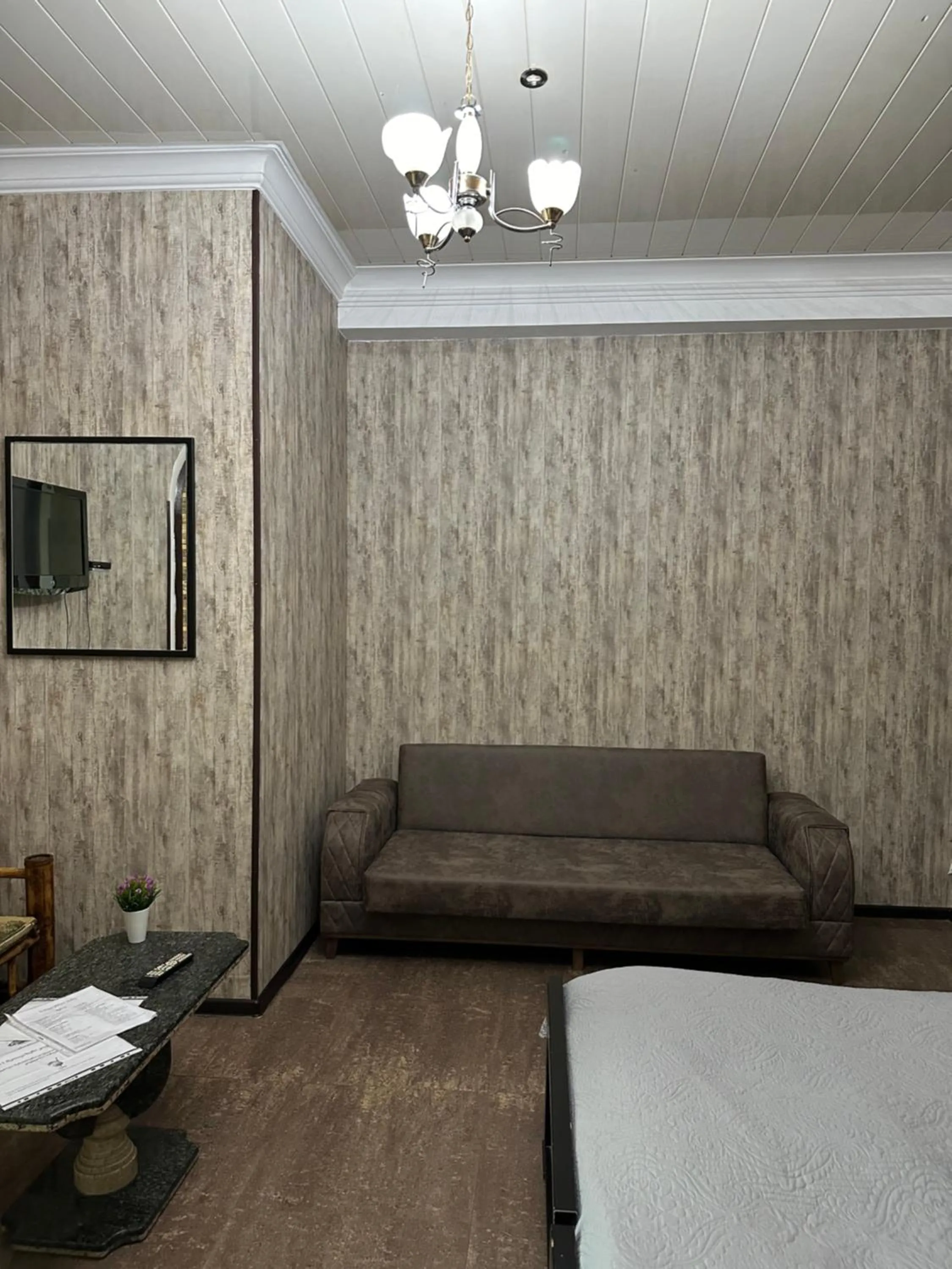 Seating area, Bed in Hotel Piza