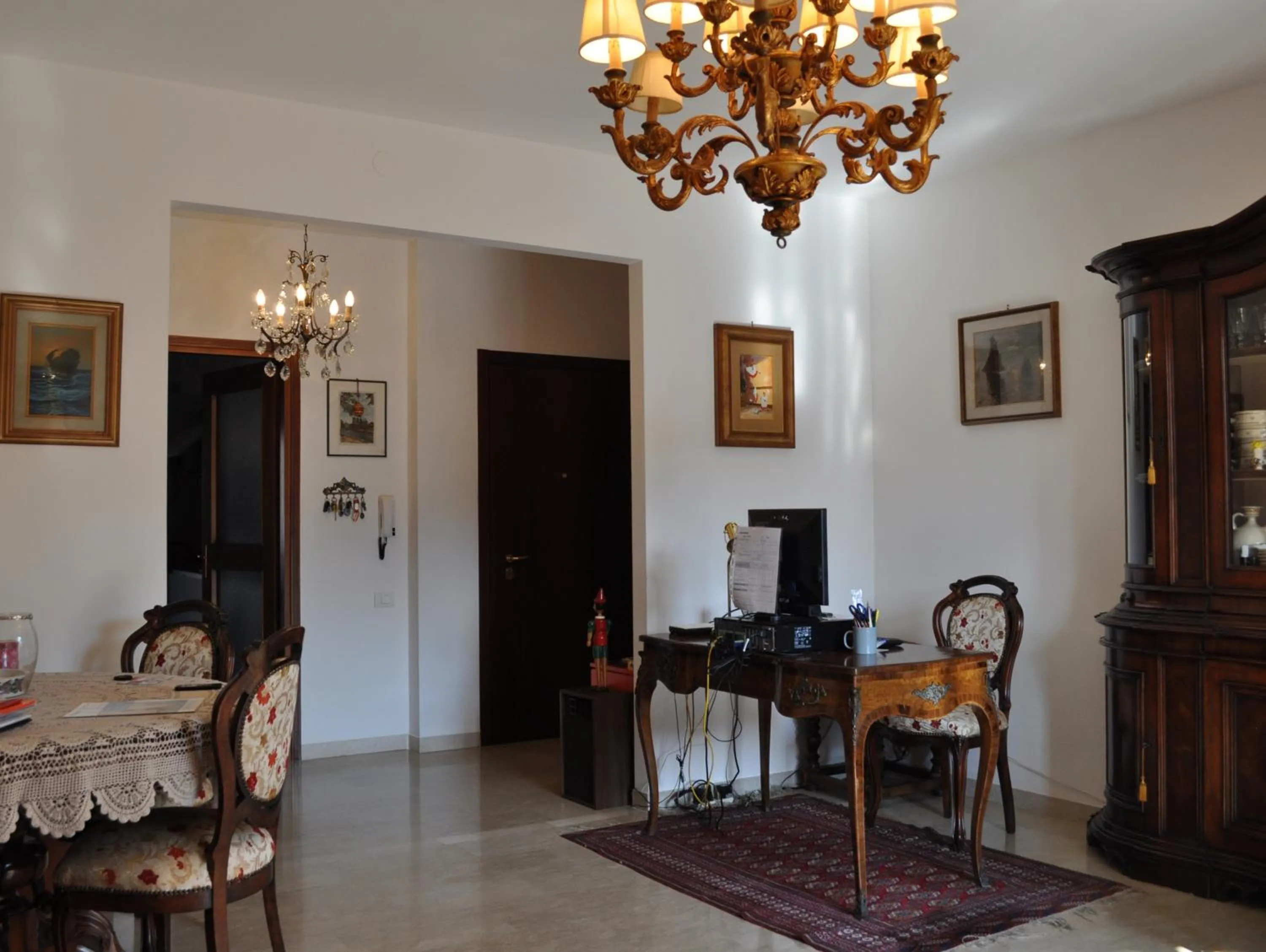 Communal lounge/ TV room in B&B Pergolesi