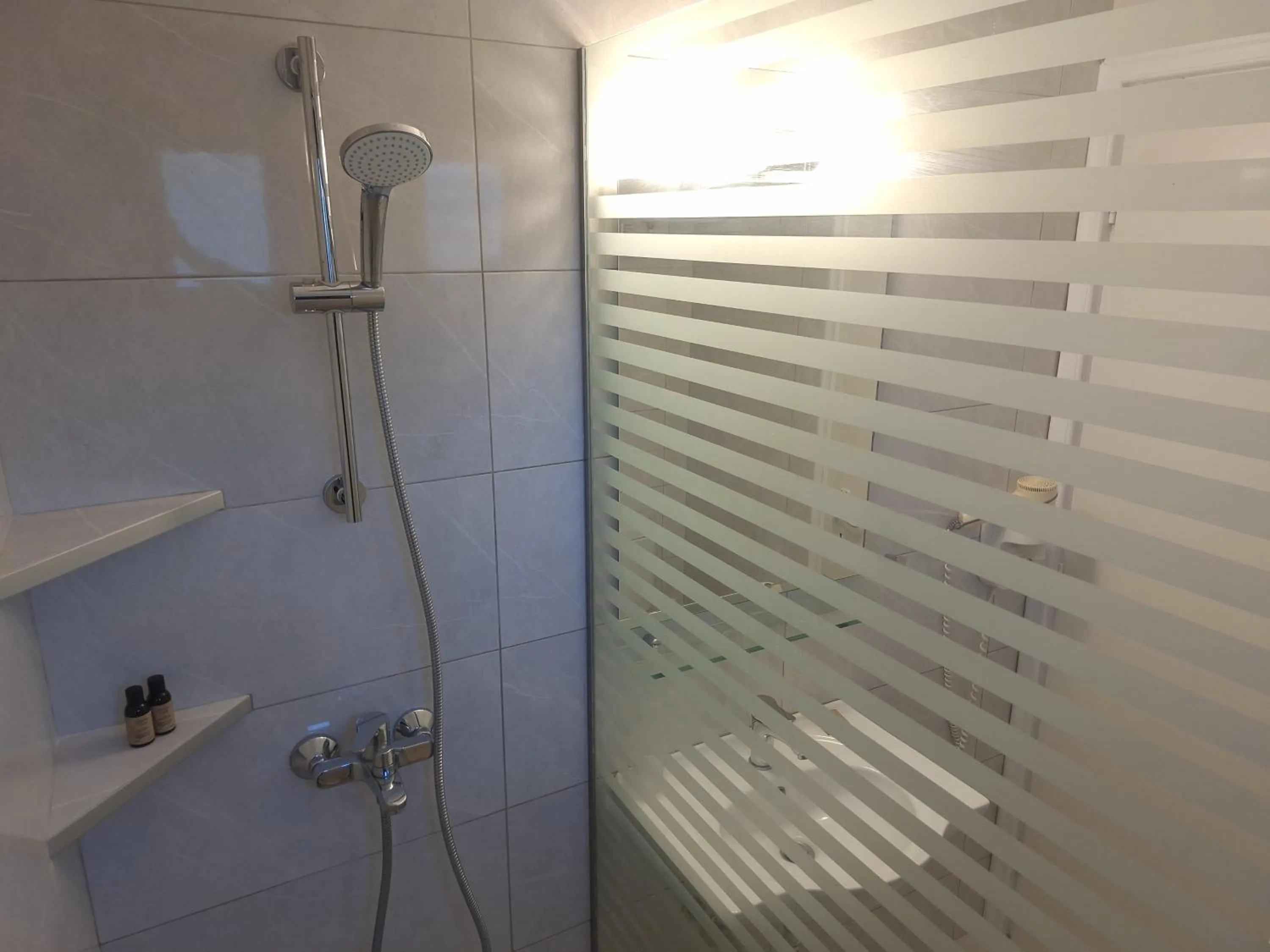 Shower in Helion Resort