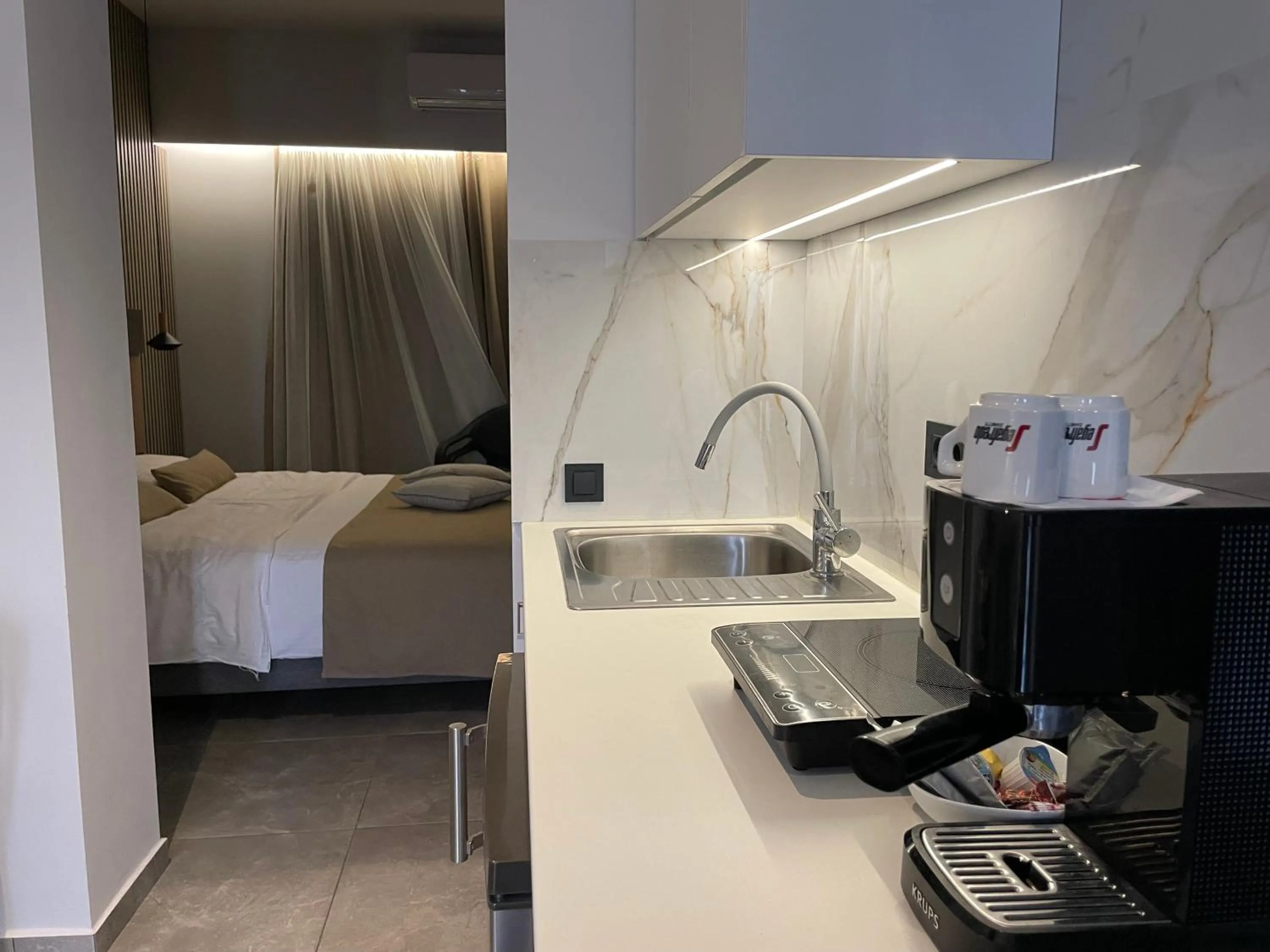 kitchen, Bed in Voula Hotel