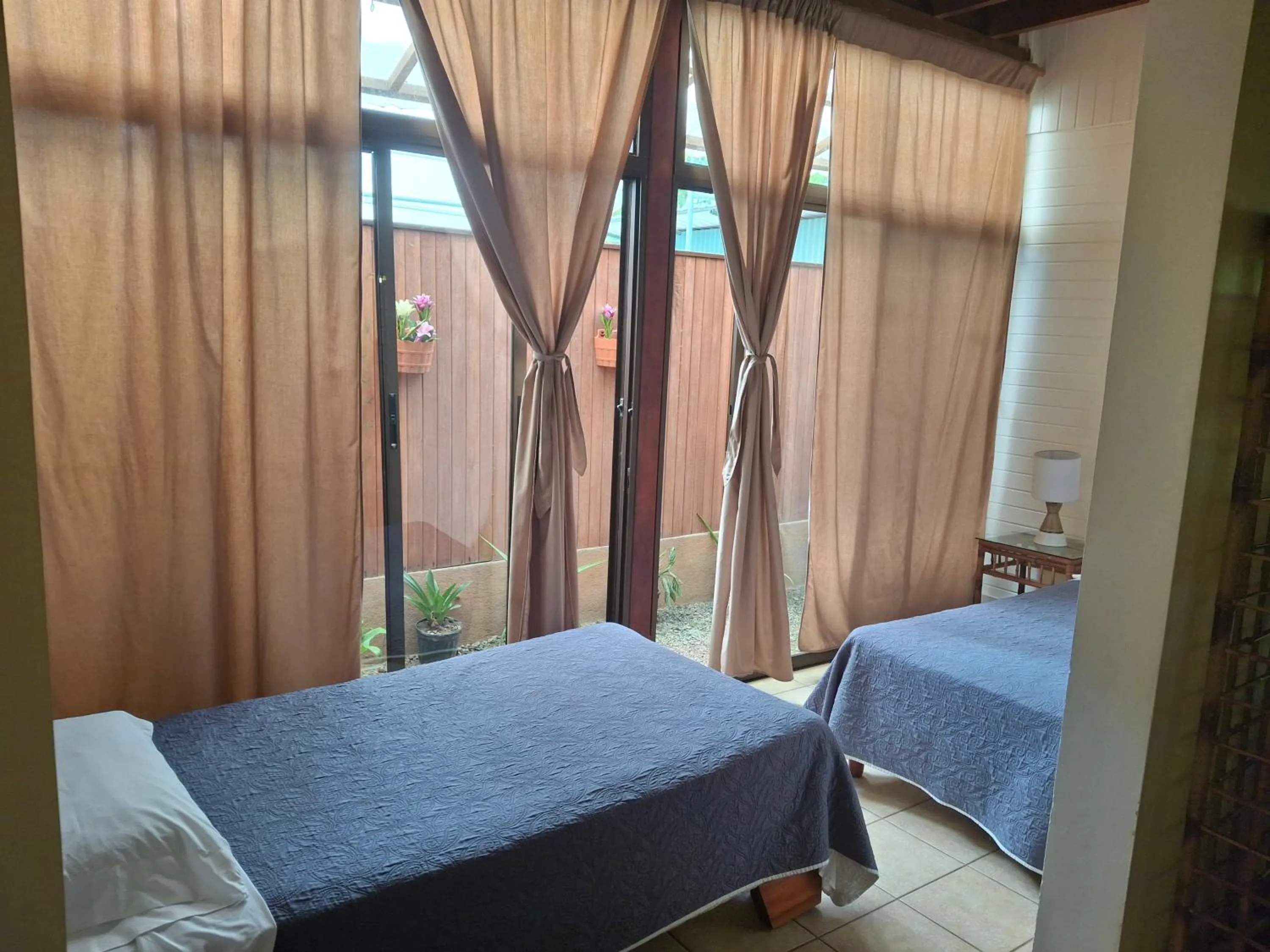 Property building, Bed in Playa Negra Guesthouse