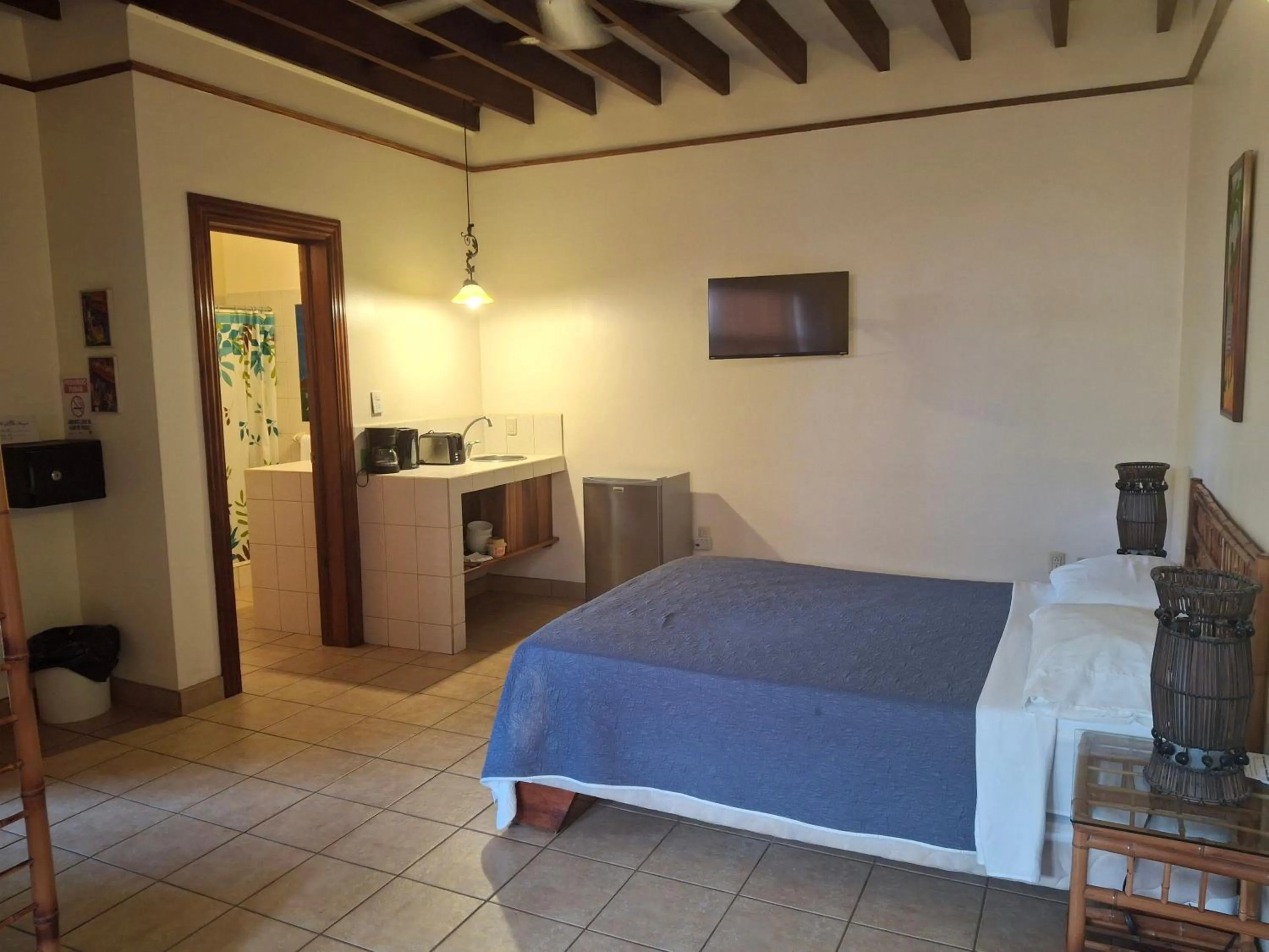 Property building, Bed in Playa Negra Guesthouse