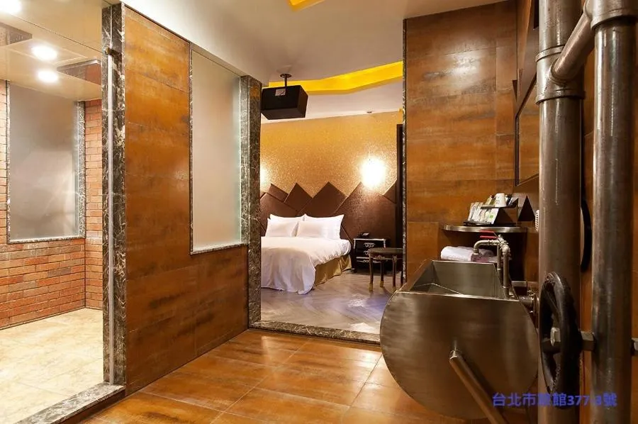 Bed in 探索汽車旅館 延平館 台北市旅館377-3號