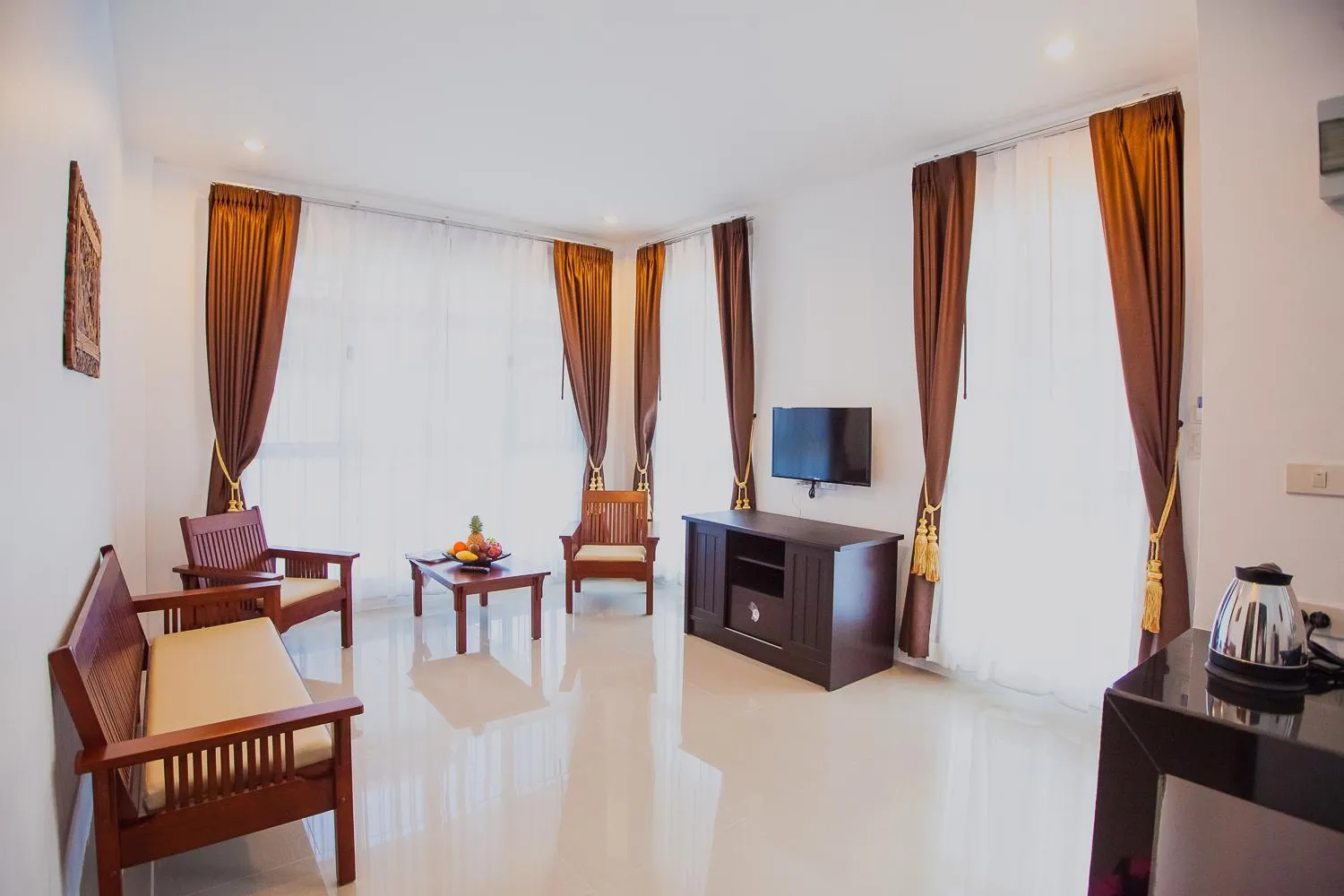 Communal lounge/ TV room in Lux Family Villas Krabi Ao Nang