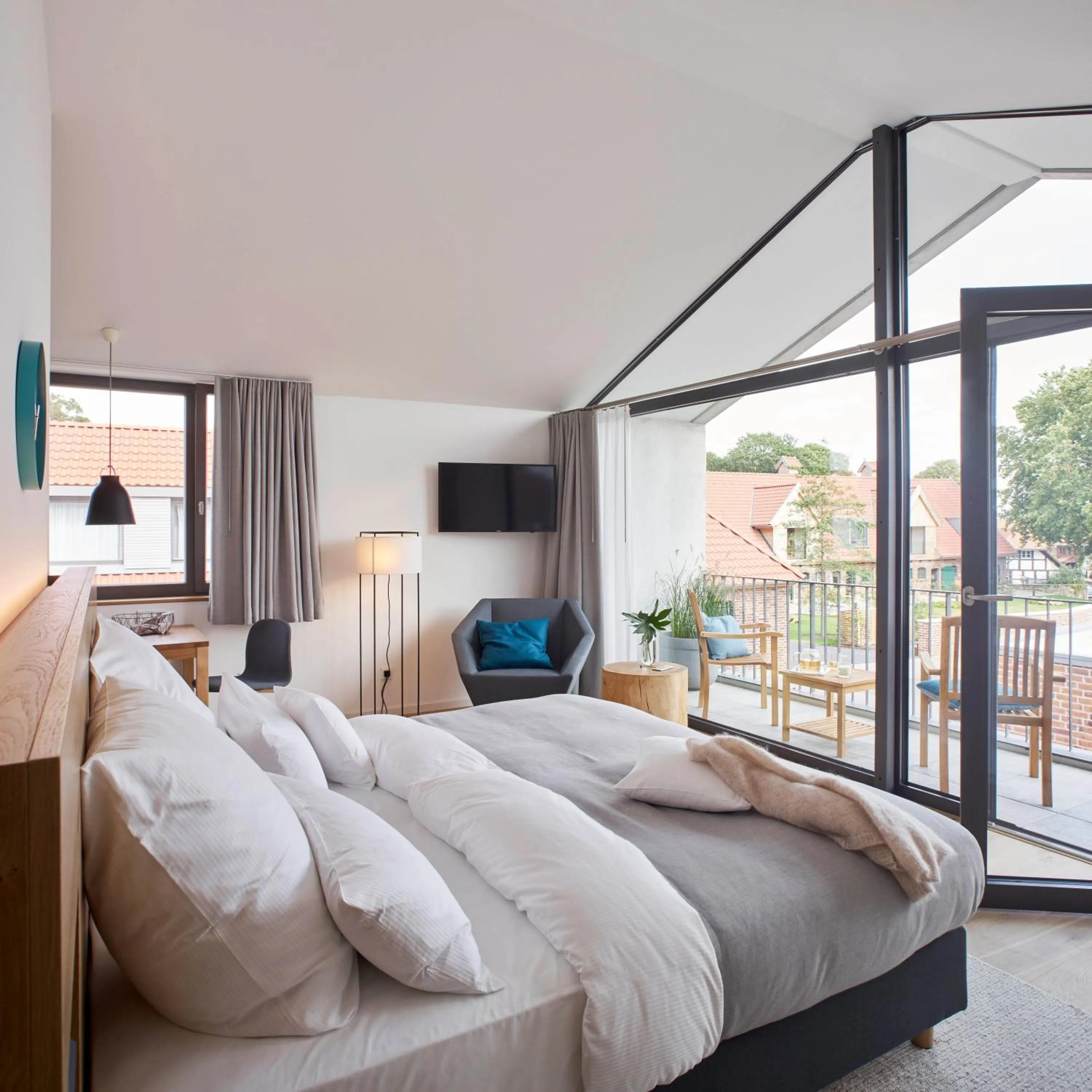 Balcony/Terrace, Bed in meinwolfsburg hotel auf dem rittergut vormals Yard Boarding Hotel