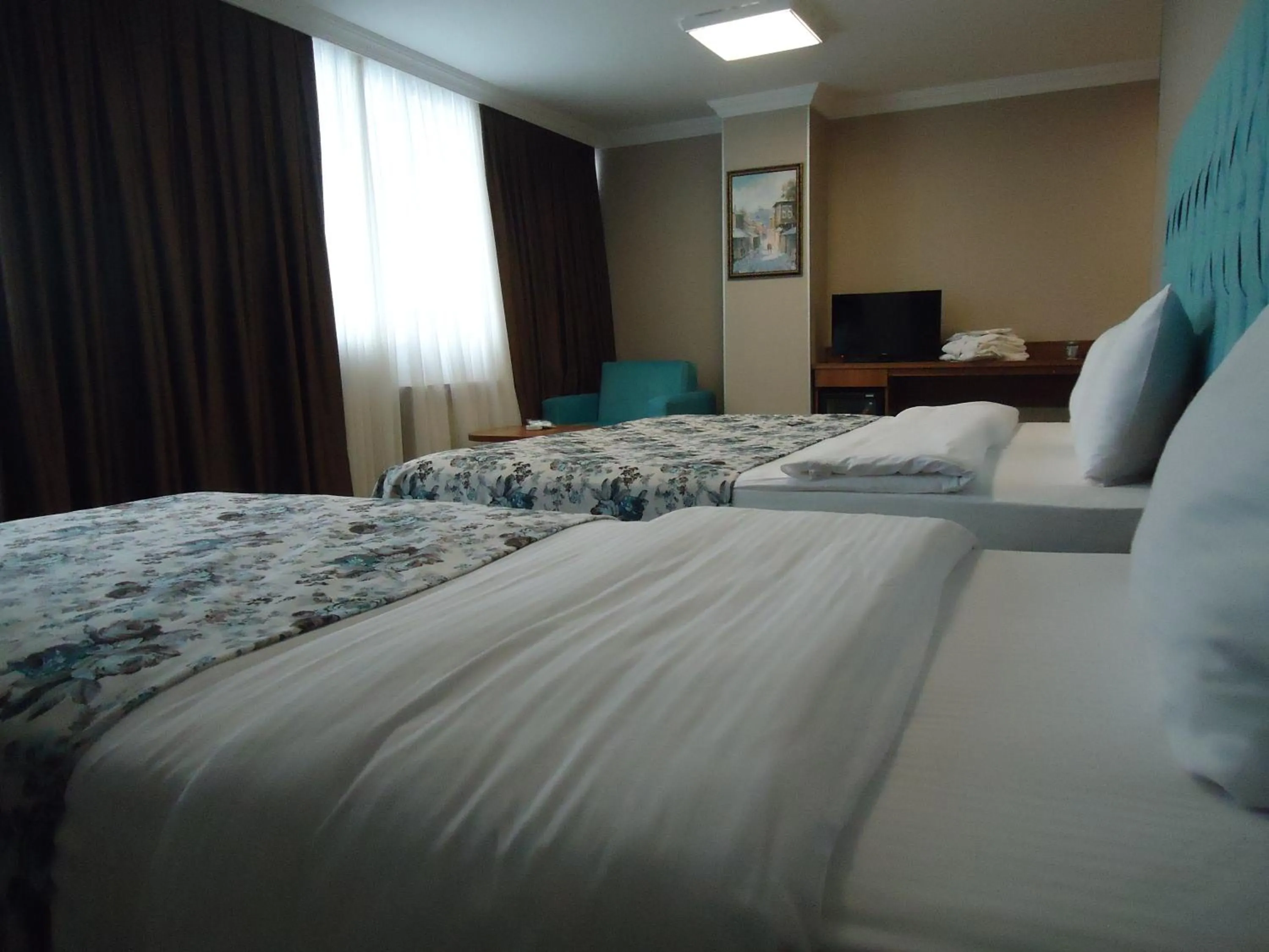 Decorative detail, Bed in Golden Lounge Hotel