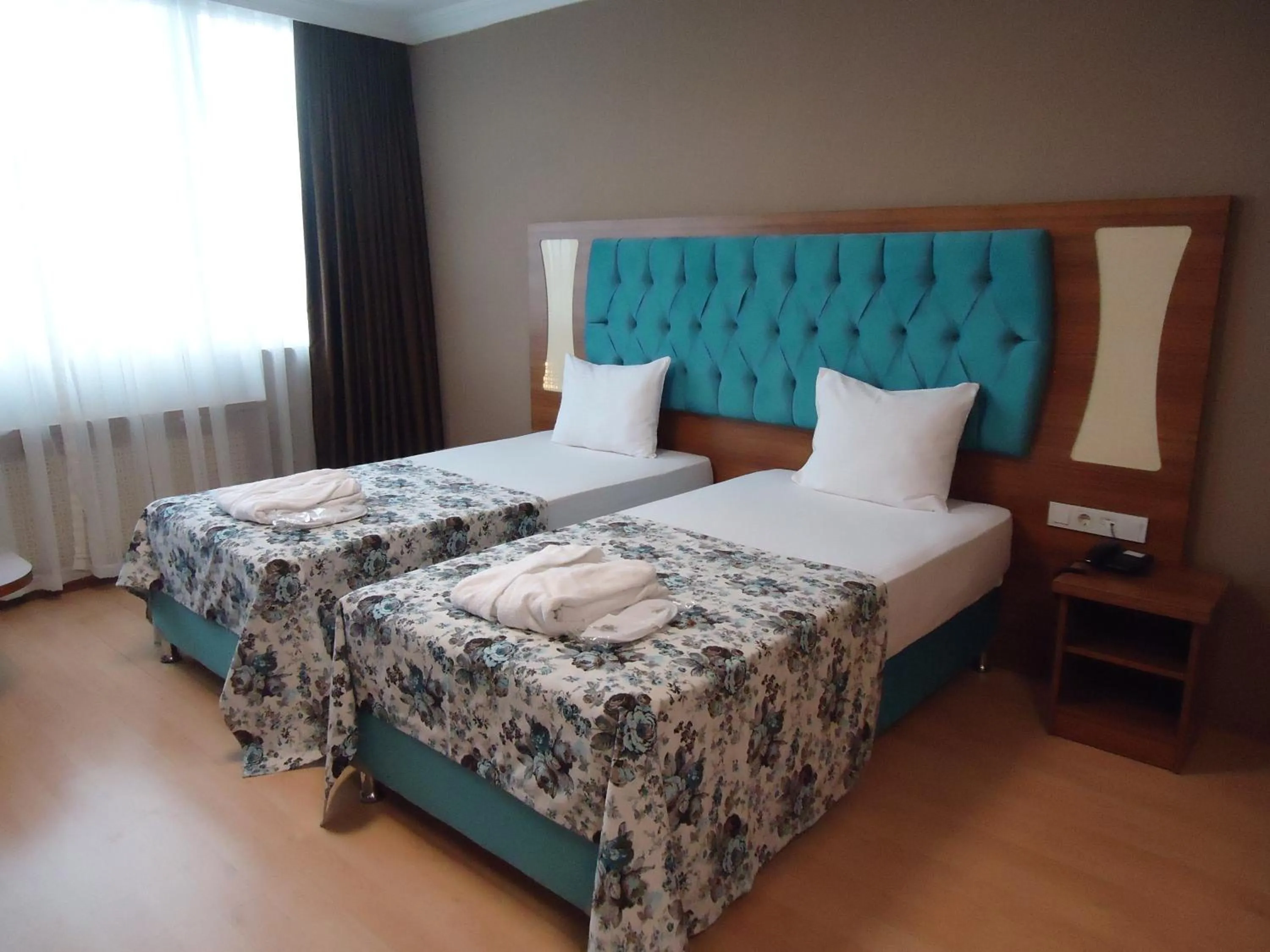 Decorative detail, Bed in Golden Lounge Hotel