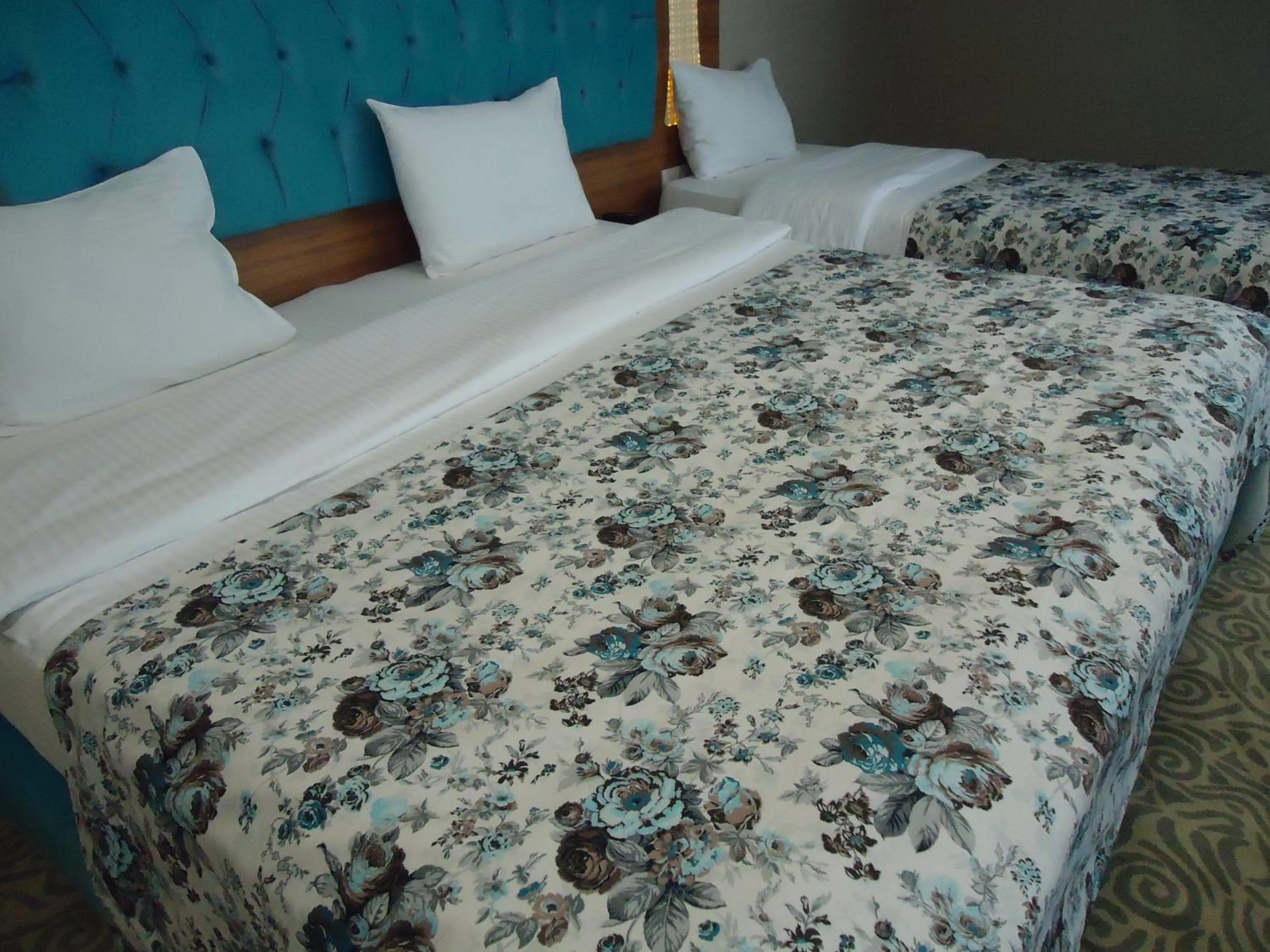 Decorative detail, Bed in Golden Lounge Hotel