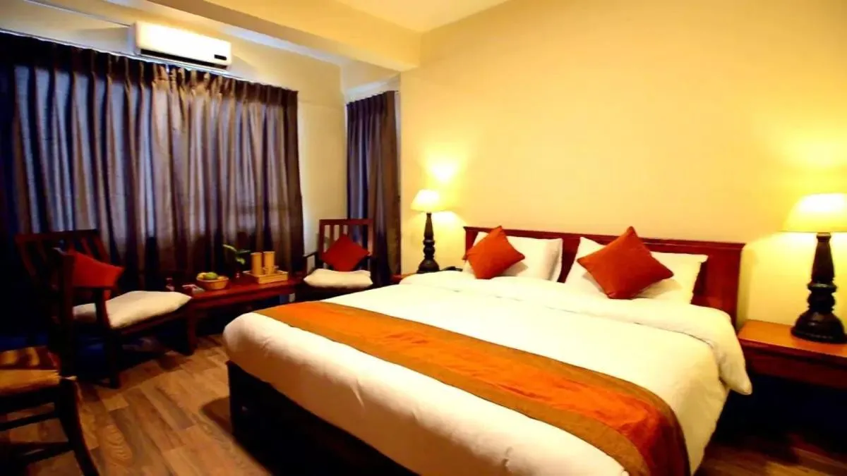 Bed in Hotel Golden Sunrise & Spa