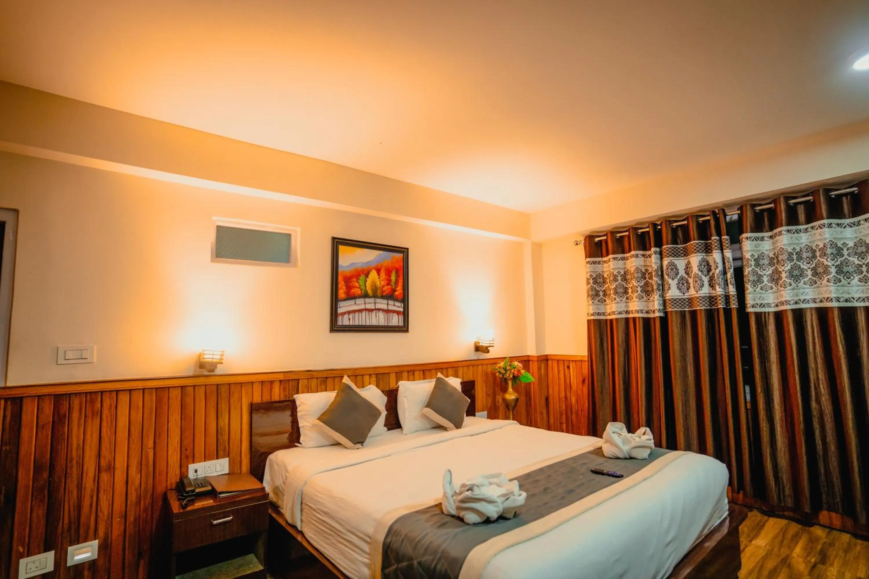 Bed in Hotel Golden Sunrise & Spa