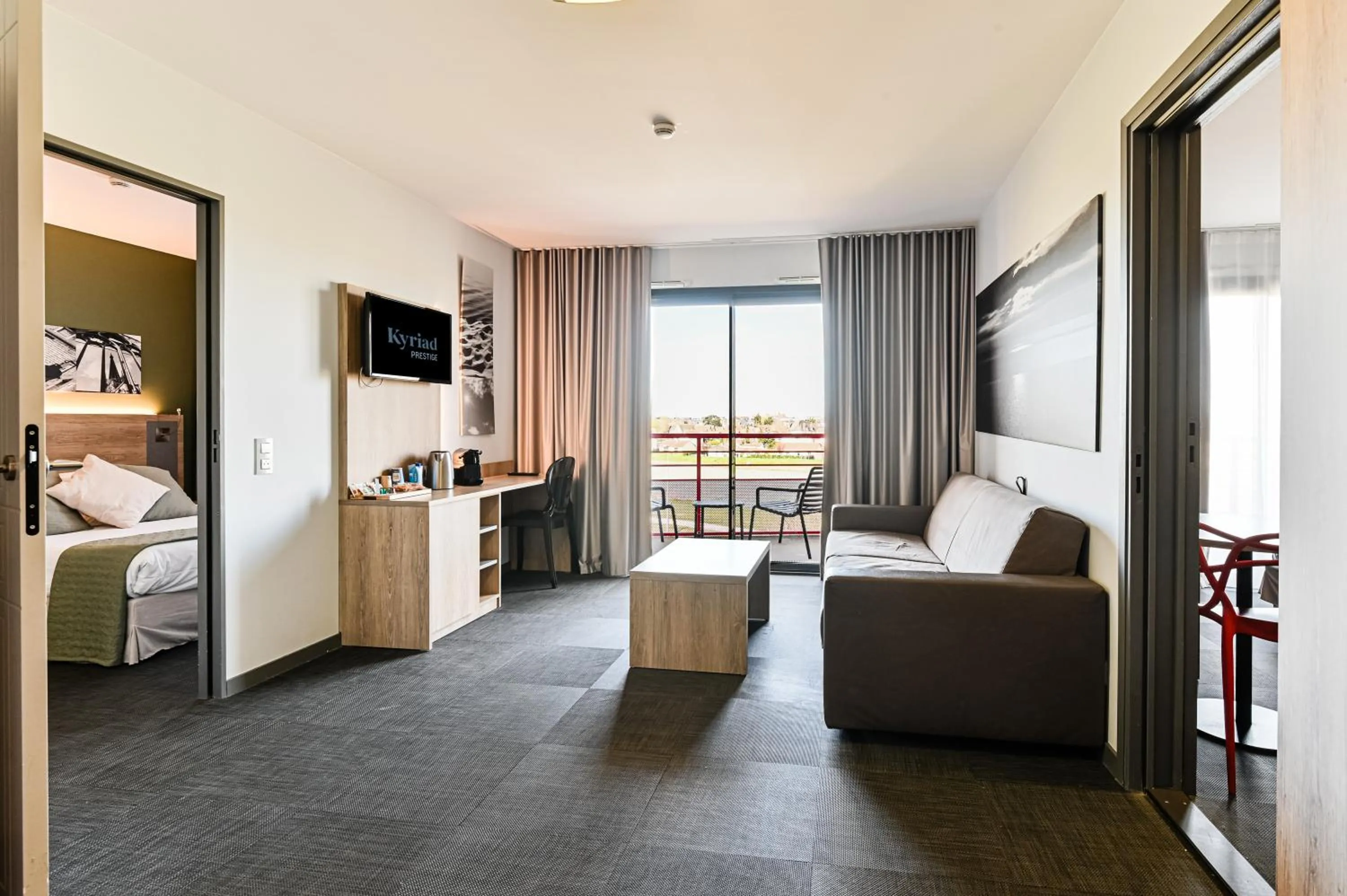 Living room, Bed in Kyriad Prestige Residence & Spa Cabourg-Dives-sur-Mer