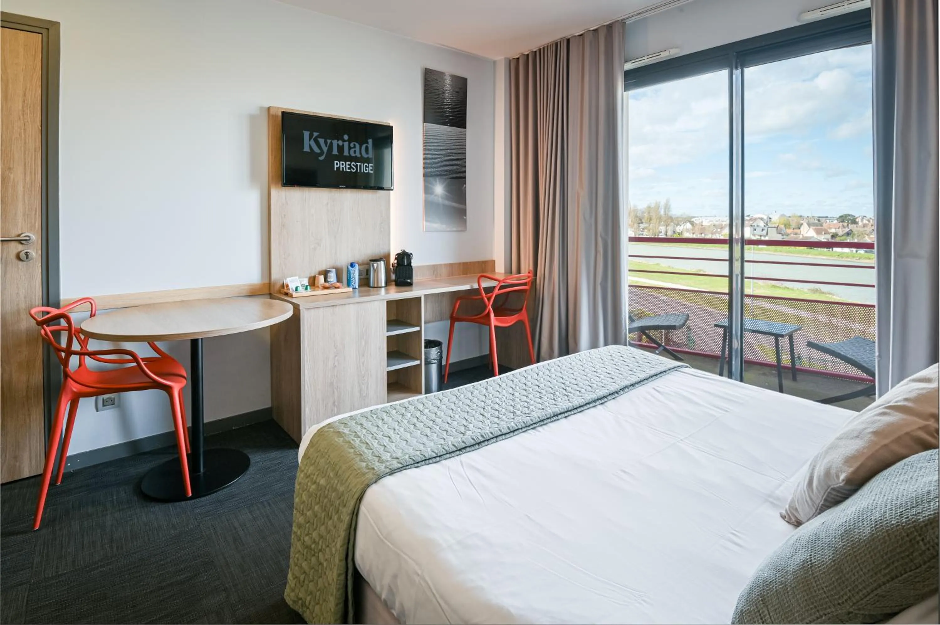 Bed in Kyriad Prestige Residence & Spa Cabourg-Dives-sur-Mer