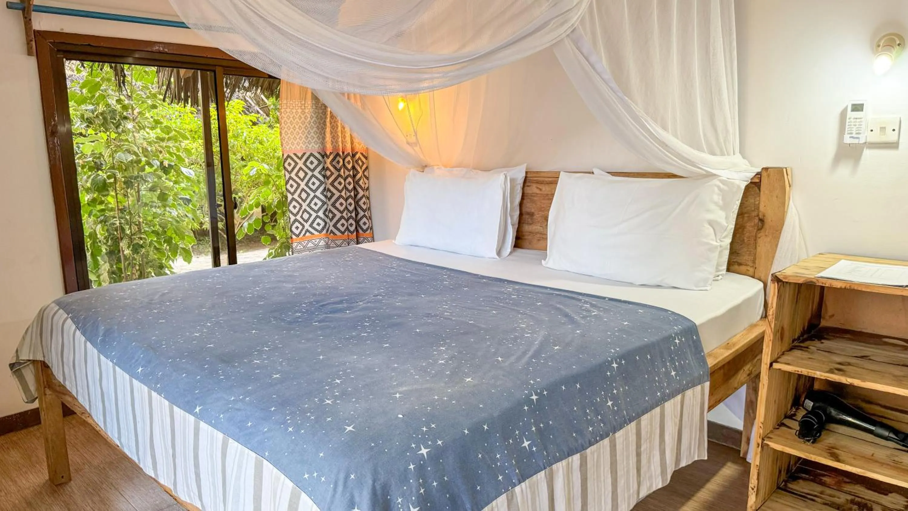 Bed in Kinazi Upepo Beach Eco Sport Resort