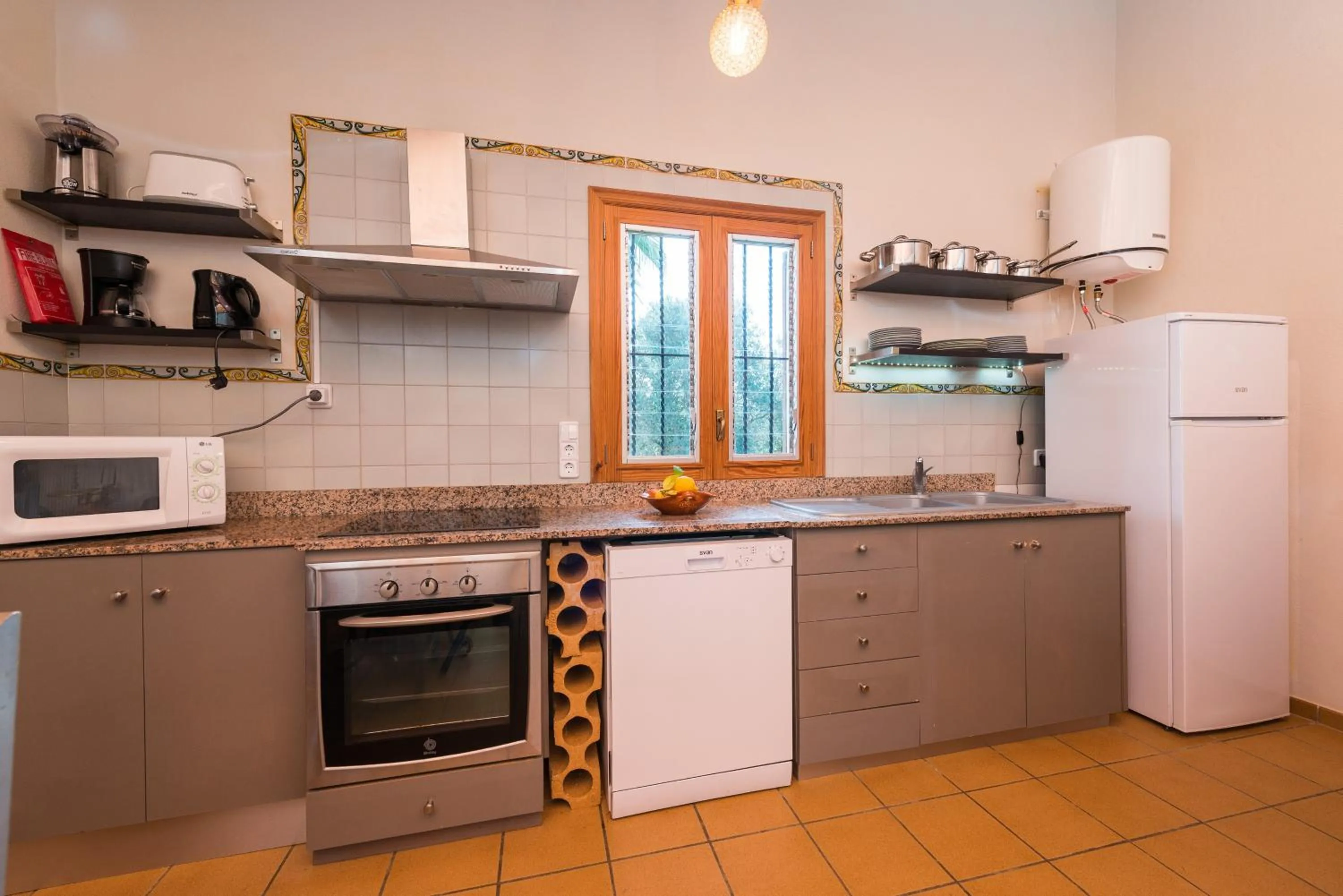 Kitchen or kitchenette in Can Gallu - Adults Only.