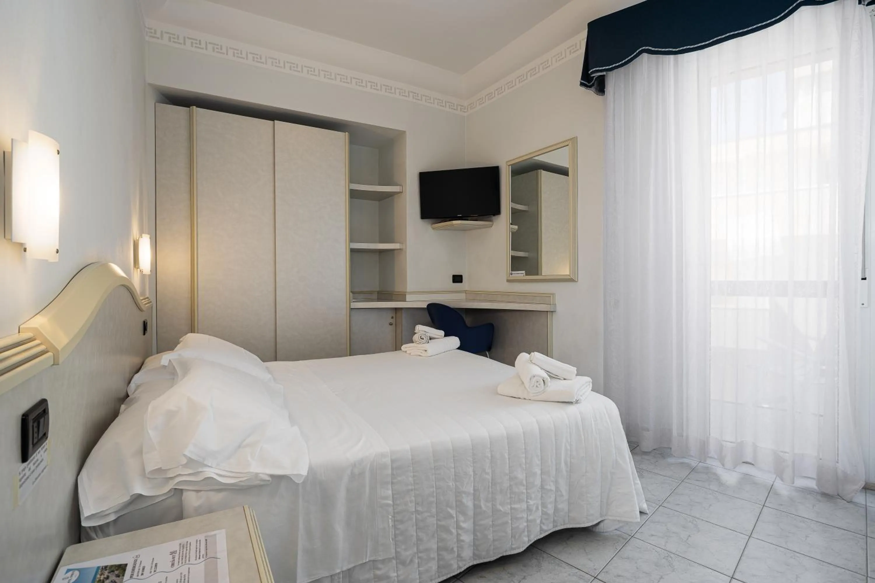 TV and multimedia, Bed in Hotel Oriente